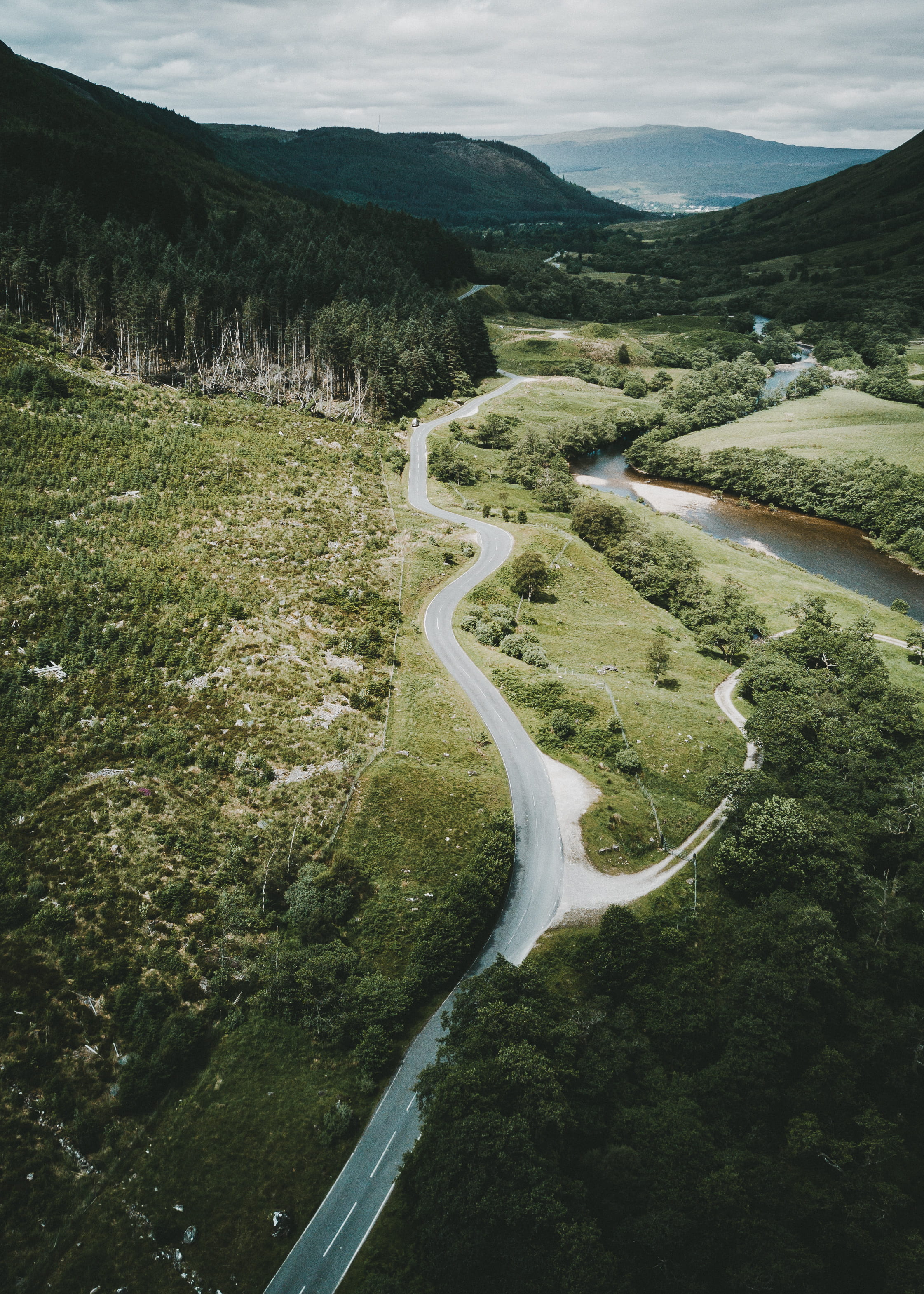 green color, winding road, outdoors, mountain road, view, highland, land, plant, non-urban scene, beauty in nature, river, woodland, tree, forest, landscape, Phone HD Wallpaper