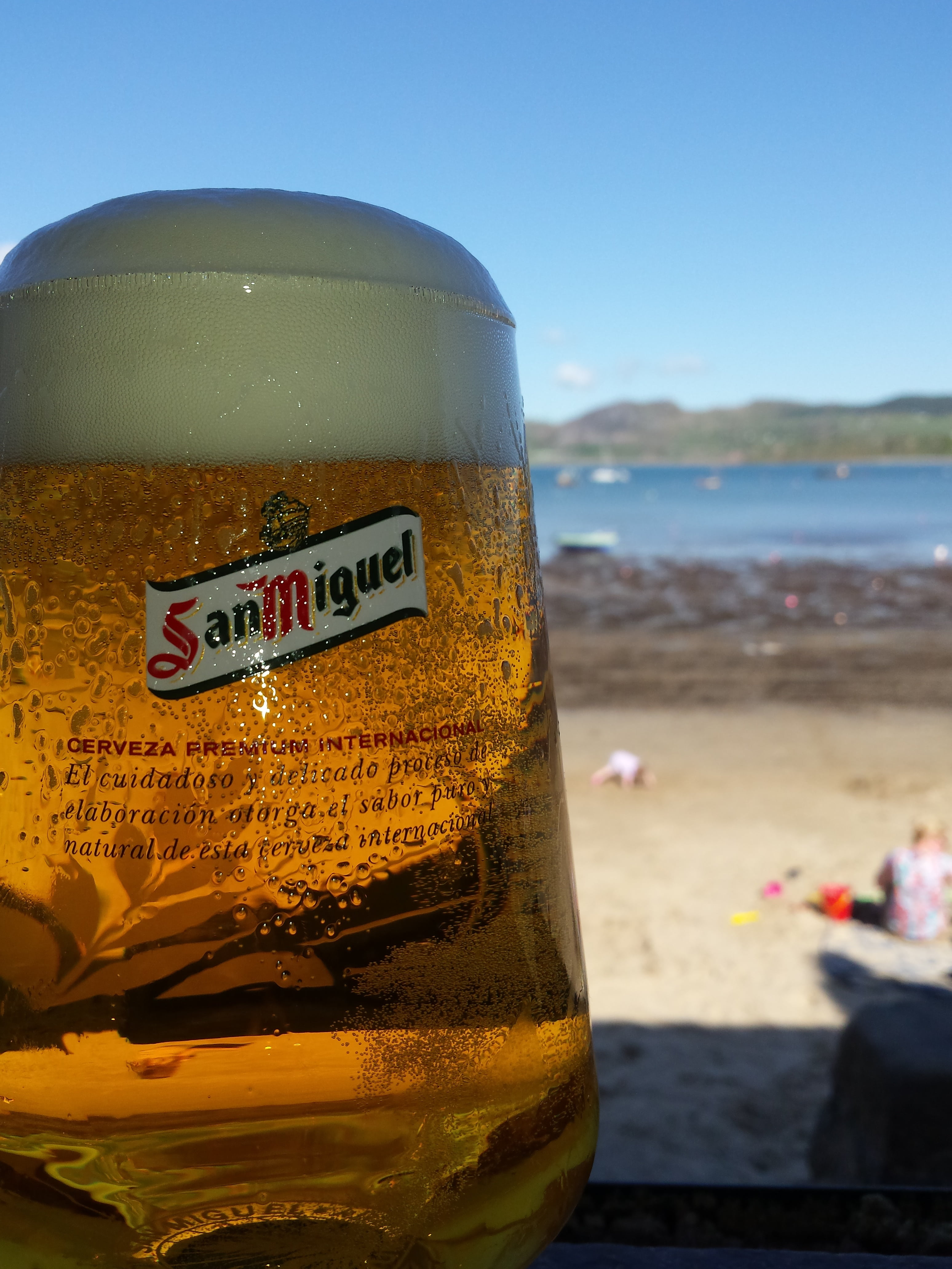 close-up, refreshment, focus on foreground, cold, 4K, glass, water, beer, beach, alcohol, sea, sky, food and drink, foam, no people, nature, wales, thirst, Phone HD Wallpaper