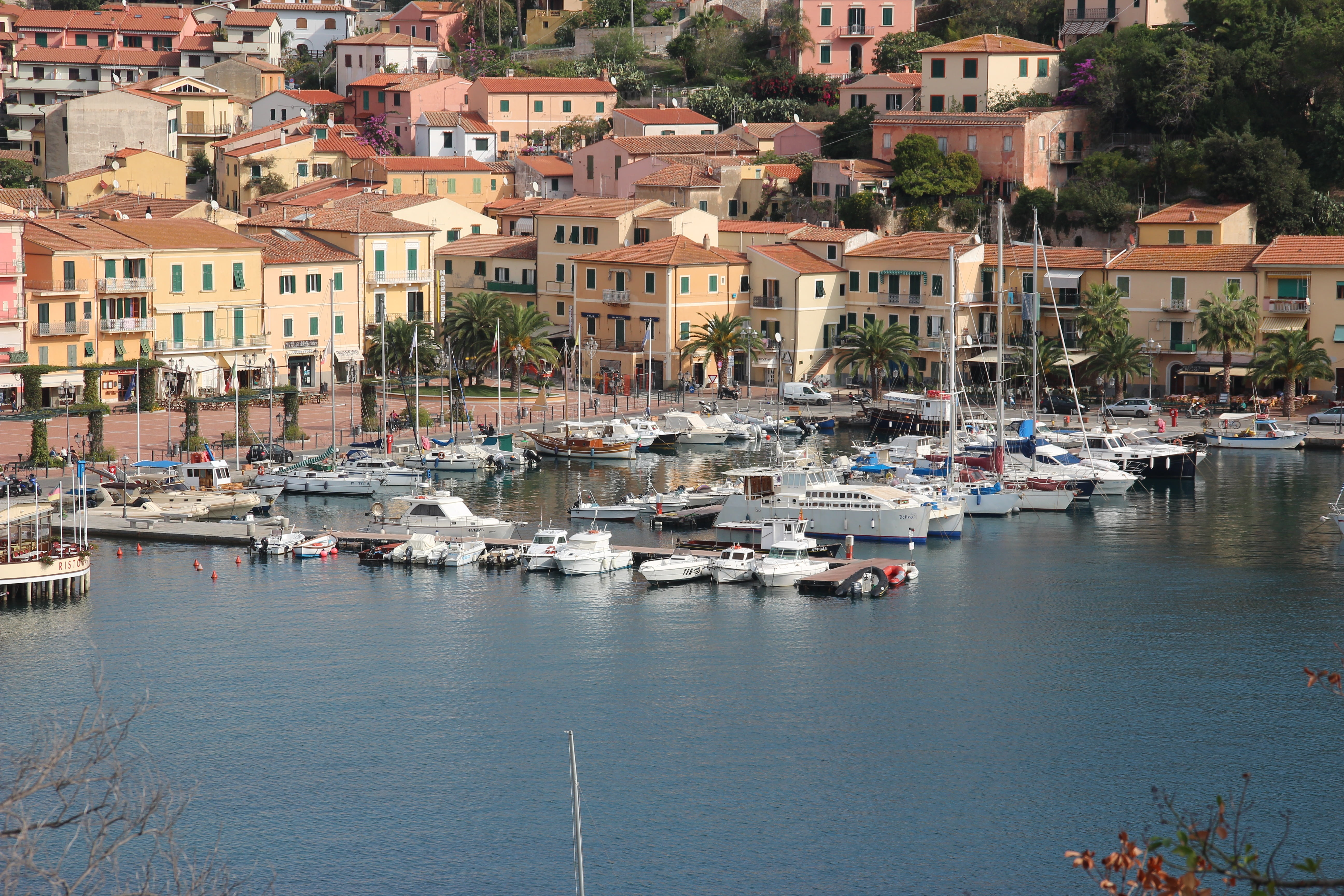 water, architecture, 5K, porto azzurro, mediterranean, island, body, boats, sea, no people, city, harbor, day, building exterior, transportation, nautical vessel, HD Wallpaper