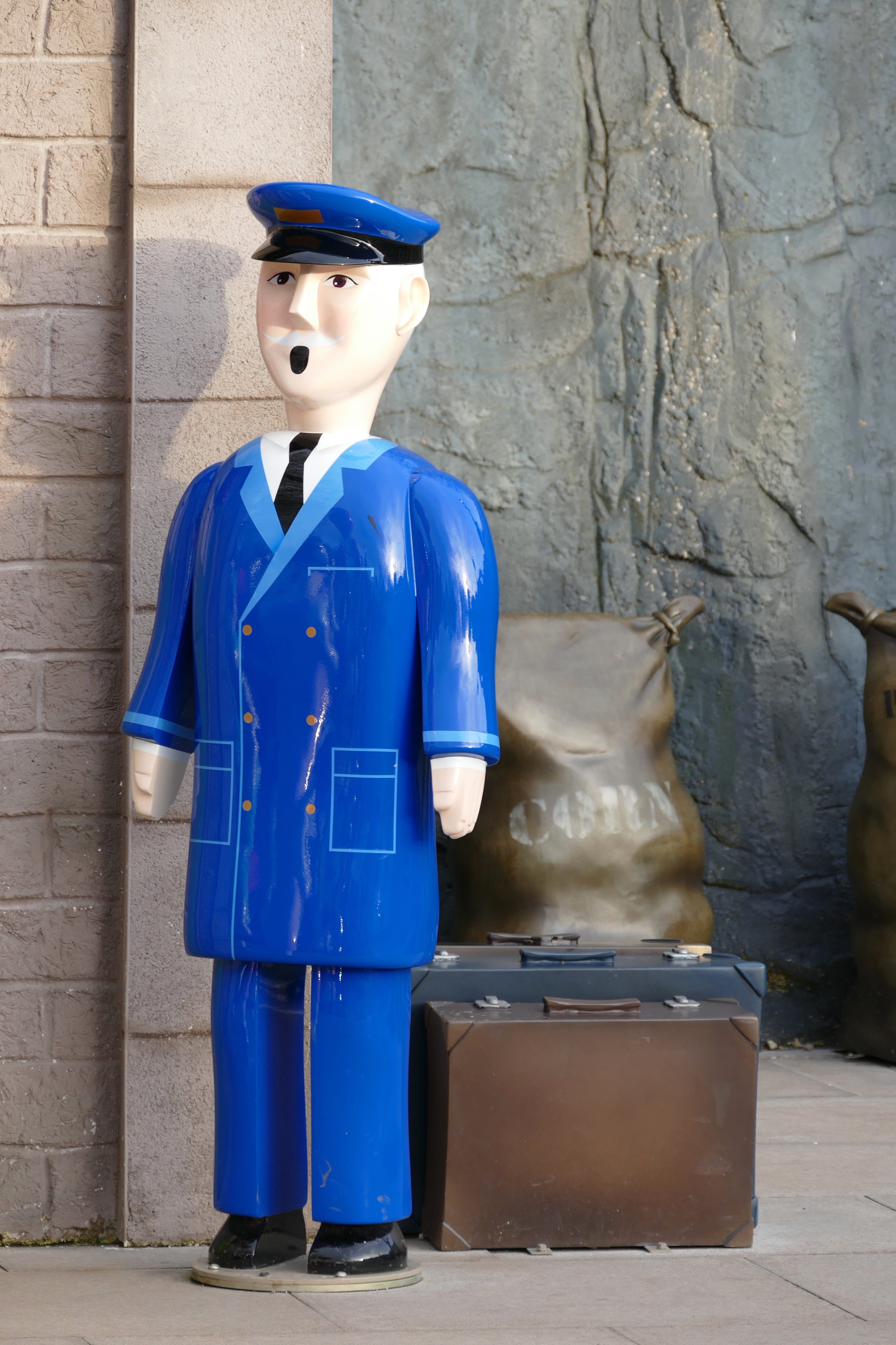 statue, plastic, transportation, blue, representation, outdoors, real people, wall - building feature, journey, standing, front view, human representation, Phone HD Wallpaper