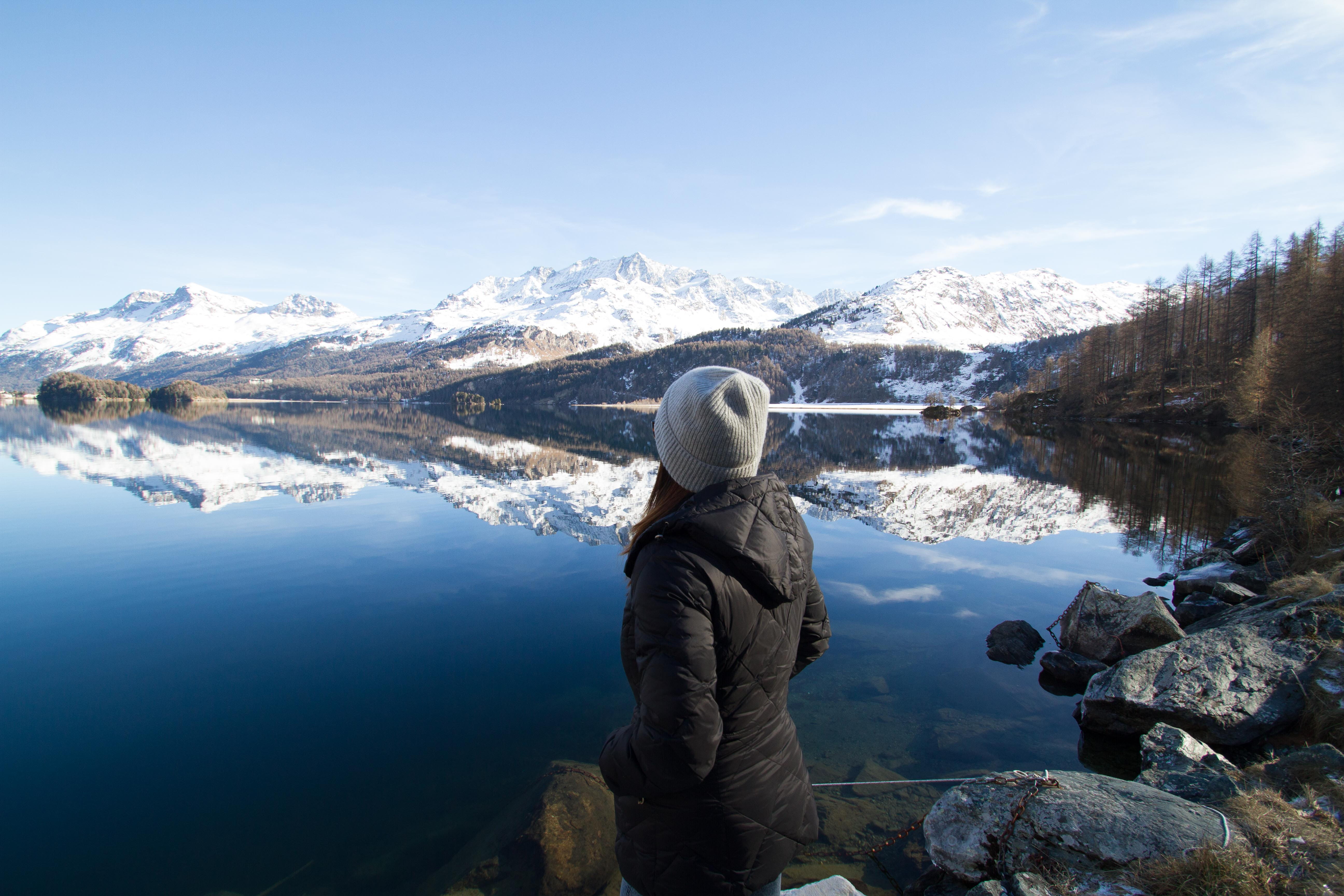 one person, river, clothing, scenics - nature, travel, blue, warm clothing, ice, mountain range, daylight, solid, woman, reflection, fall, coat, outdoors, HD Wallpaper