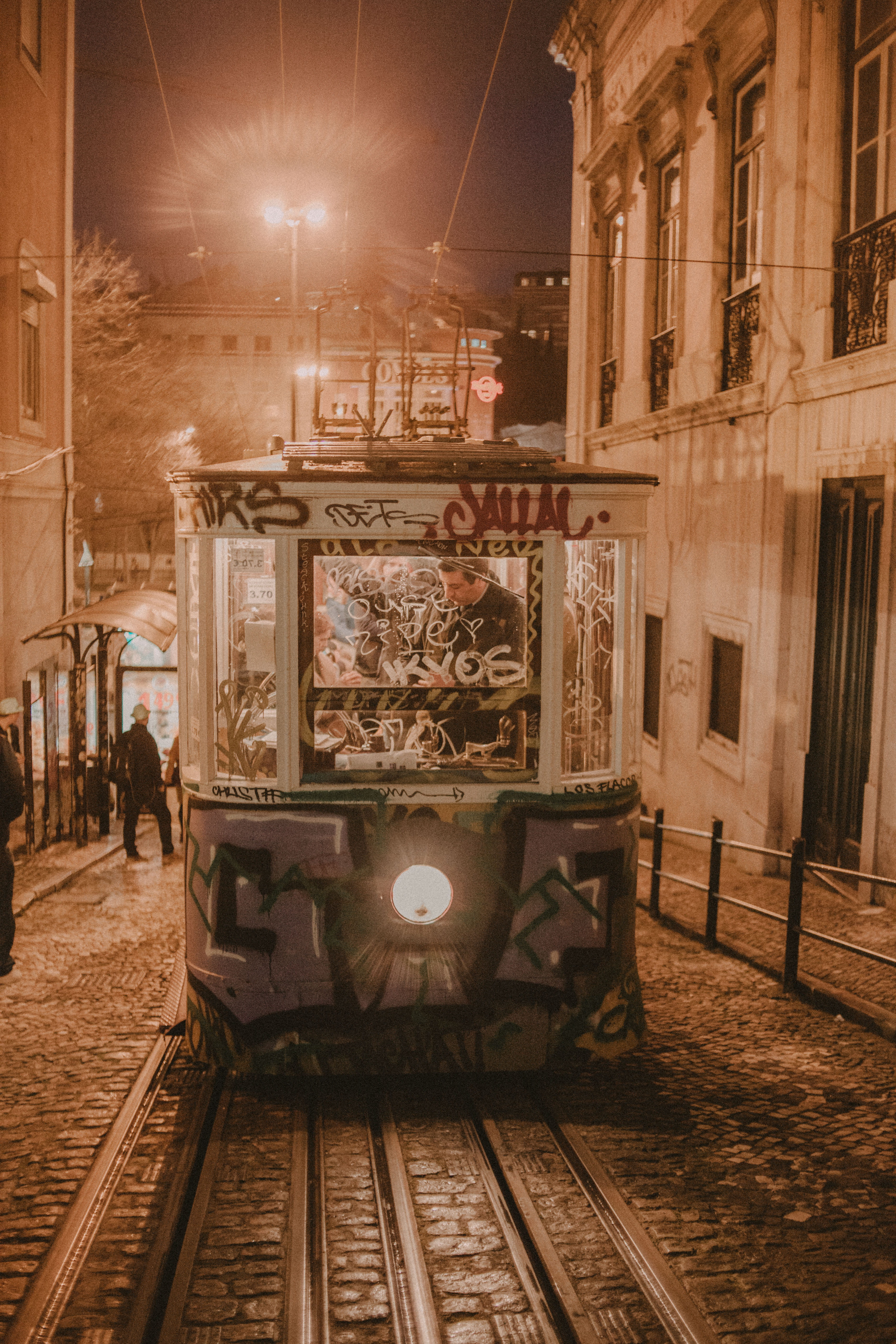 group of people, street light, portugal, cableway, street, night, illuminated, architecture, outdoors, train, urban, railroad track, building exterior, Phone HD Wallpaper