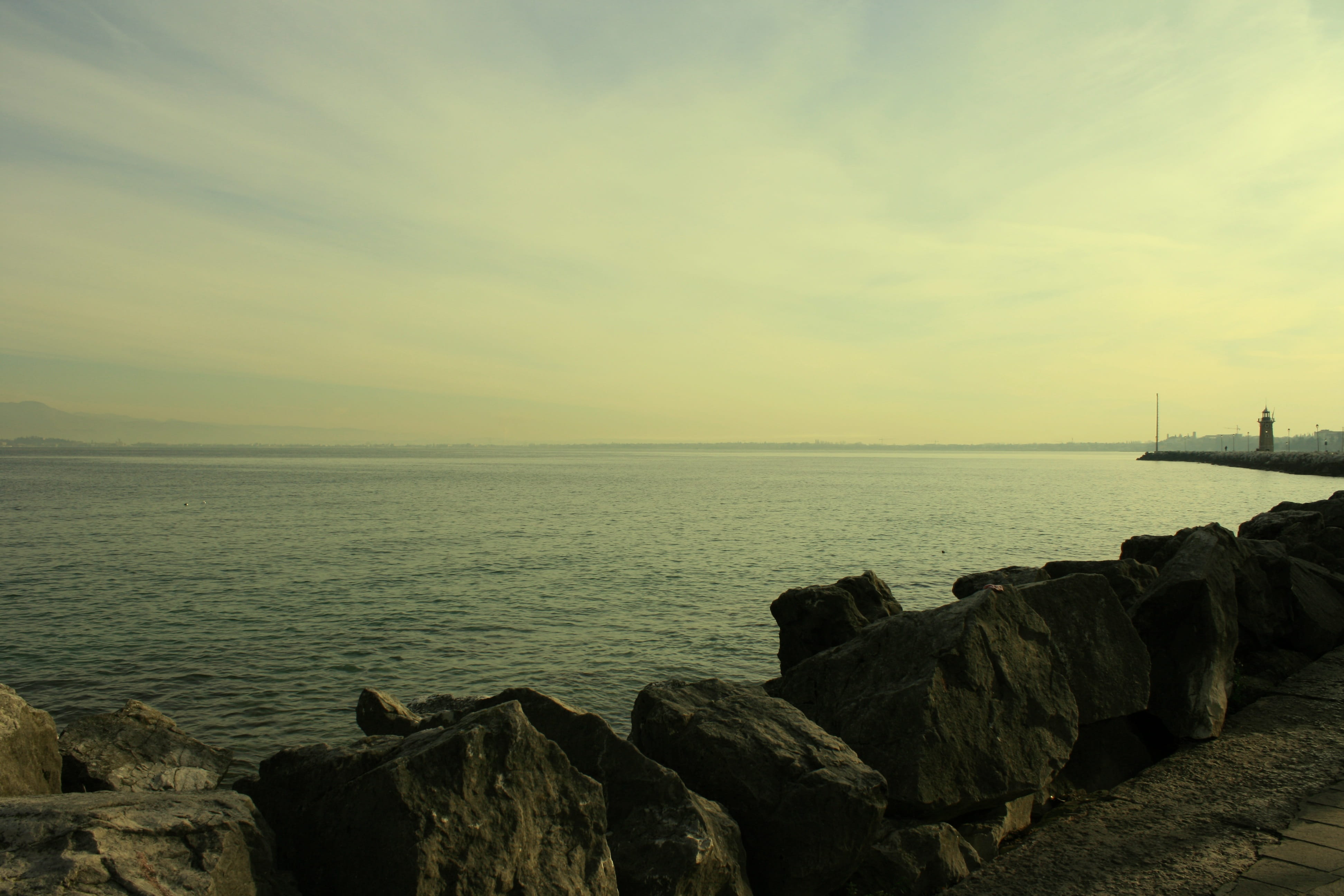 no people, rock, tranquility, beach, beauty in nature, 4K, rock - object, sunset, cloud - sky, italy, Lake Garda, tranquil scene, on-the-lake garda, water, HD Wallpaper