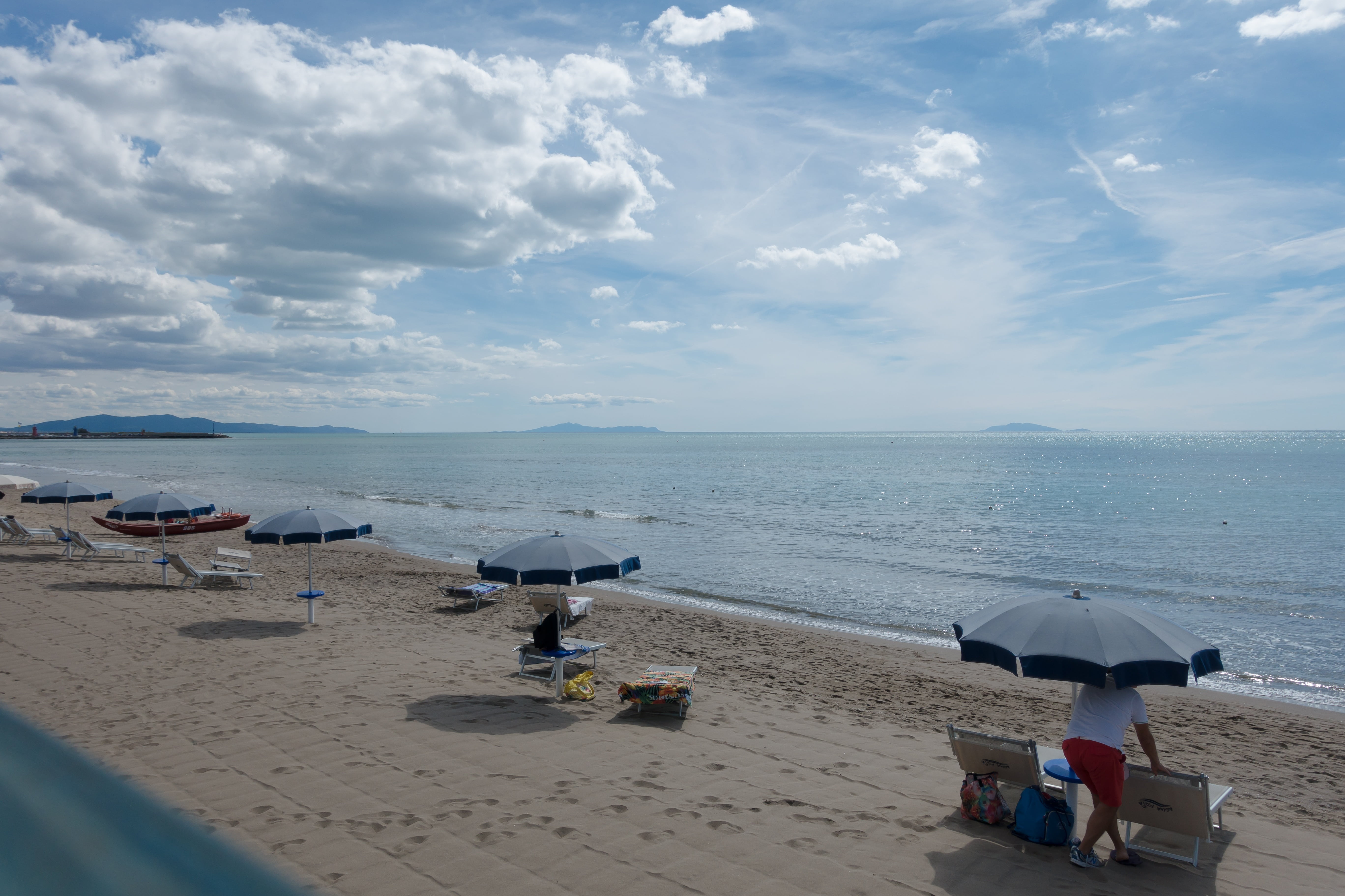 protection, view, nature, 5K, cloud - sky, blue, outdoors, maremma, scenics - nature, horizon, island, water, clouds, sea, beach umbrella, sand, shade, HD Wallpaper