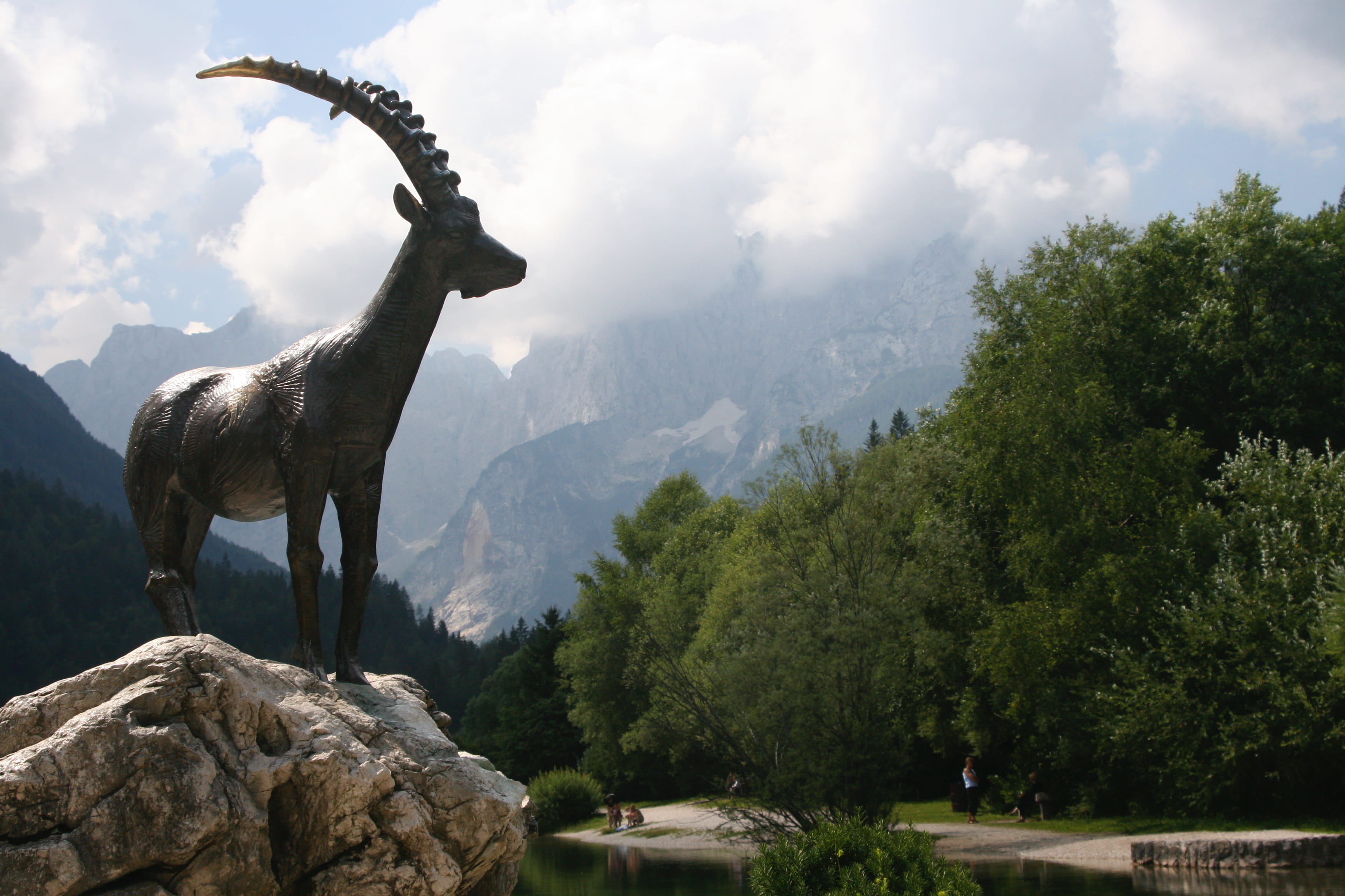 statue, julian alps, sculpture, domestic animals, mountain, plant, animal, outdoors, zlatorog, 2K, one animal, animal themes, animal wildlife, beauty in nature, HD Wallpaper