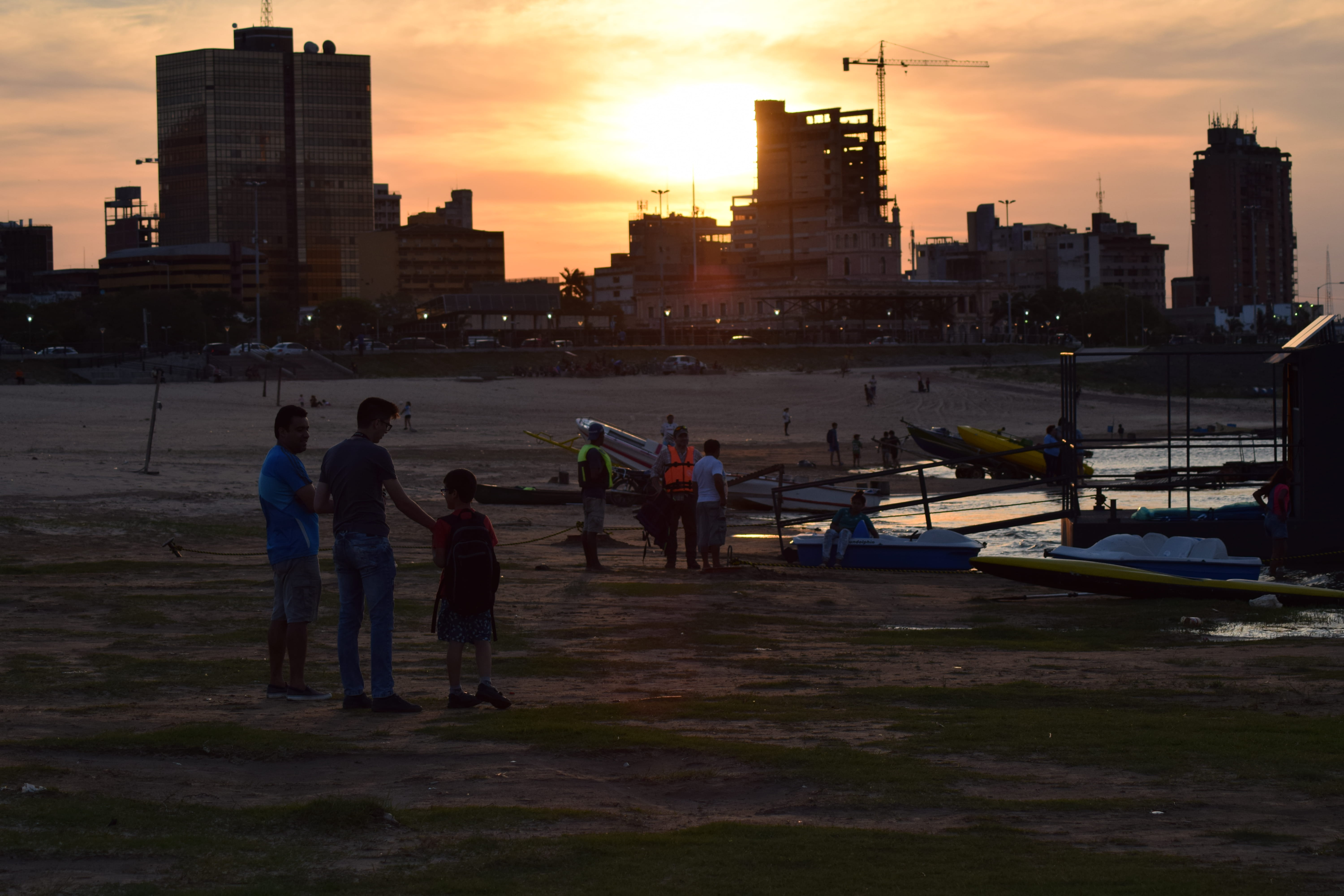 costanera, leisure activity, asunción, men, avenida costanera josé asunción flores, building, architecture, sky, orange color, 5K, water, sunset, nature, HD Wallpaper