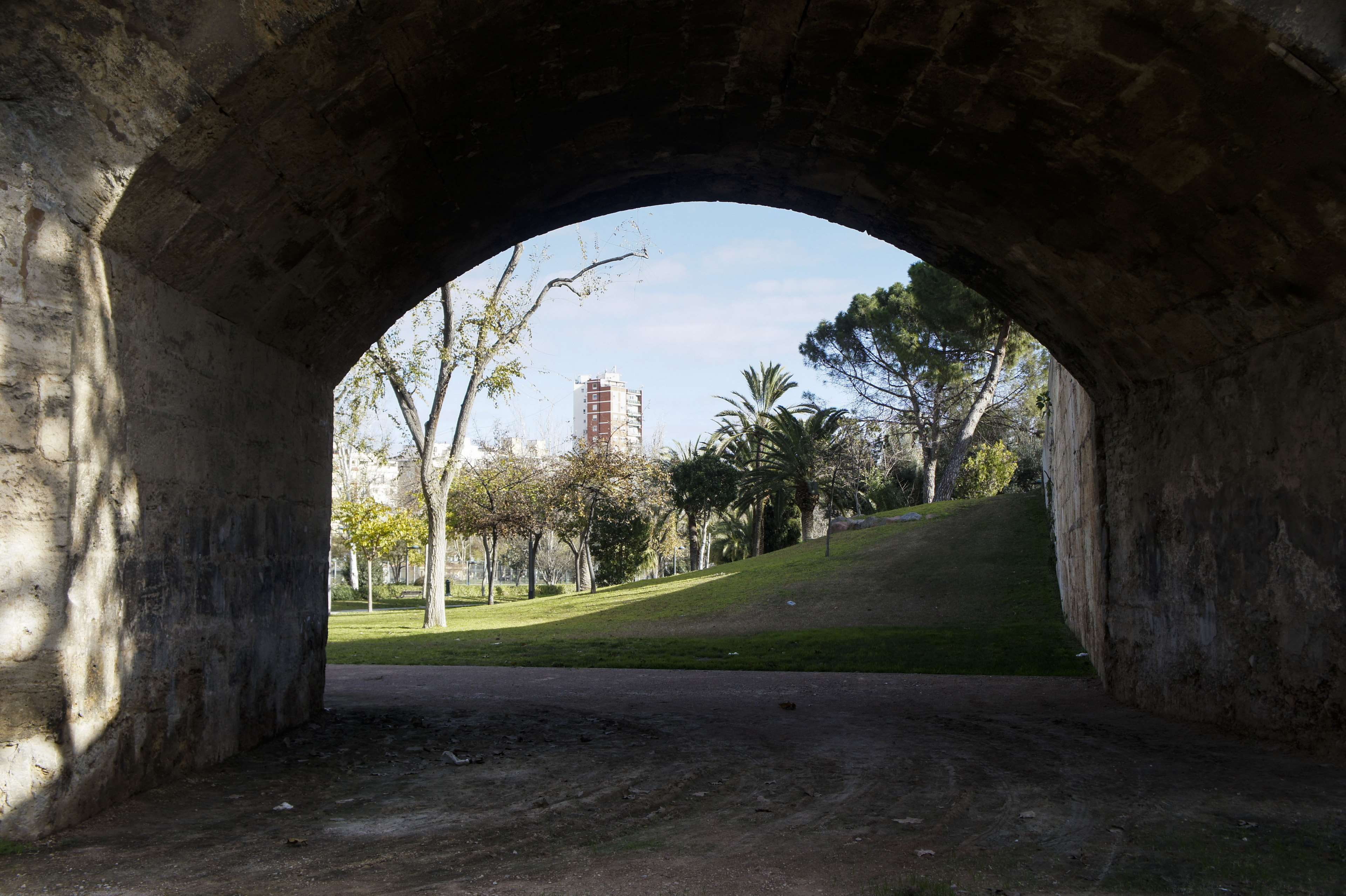 no people, grass, city, architecture, sky, outdoors, puente, transportation, nature, road, plant, 4K, arch, rio turia, direction, the past, cloud - sky, HD Wallpaper