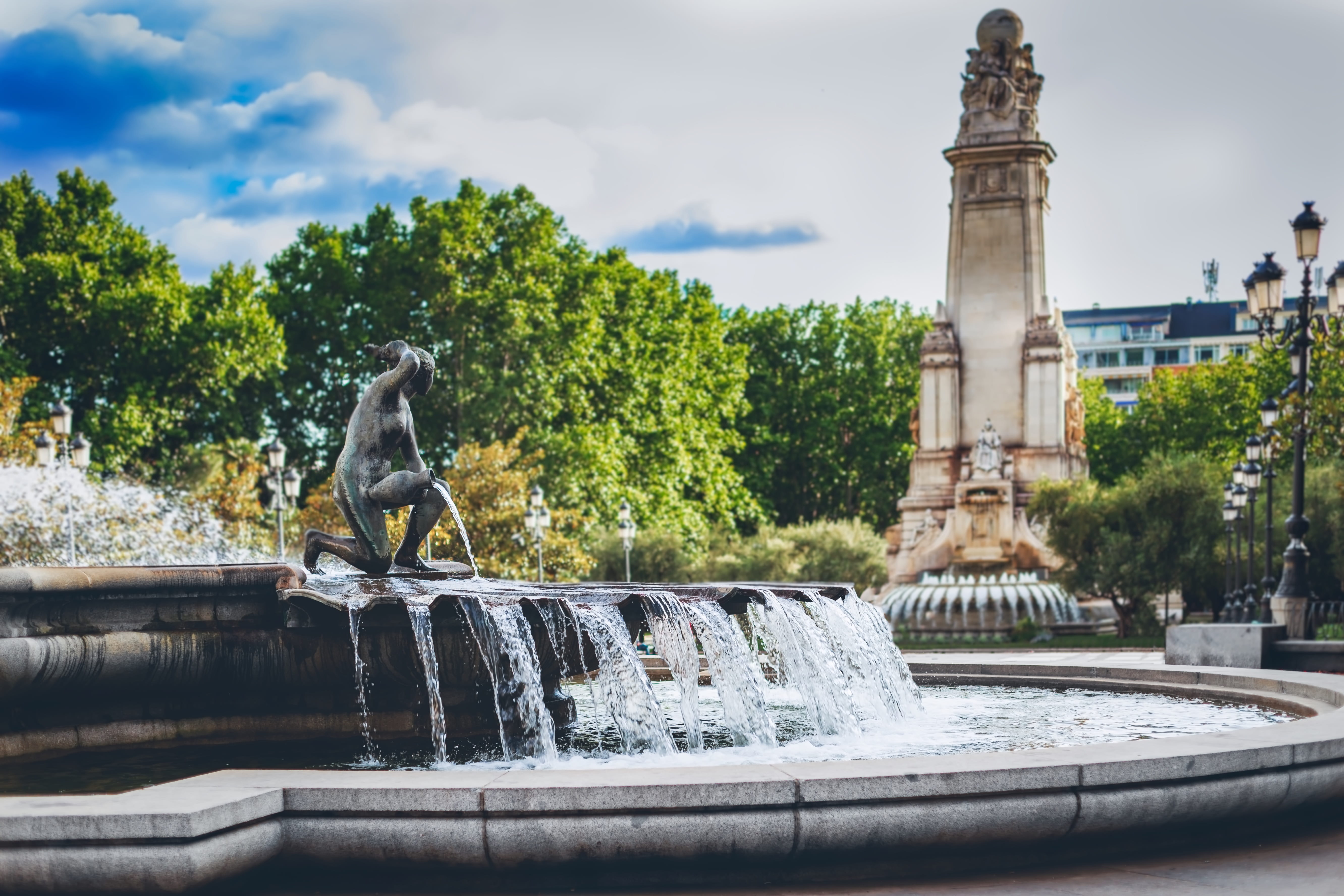 spraying, flowing, art and craft, building exterior, tree, madrid, fountain, sky, exterior, no people, built structure, outdoors, city, cervantes, representation, HD Wallpaper