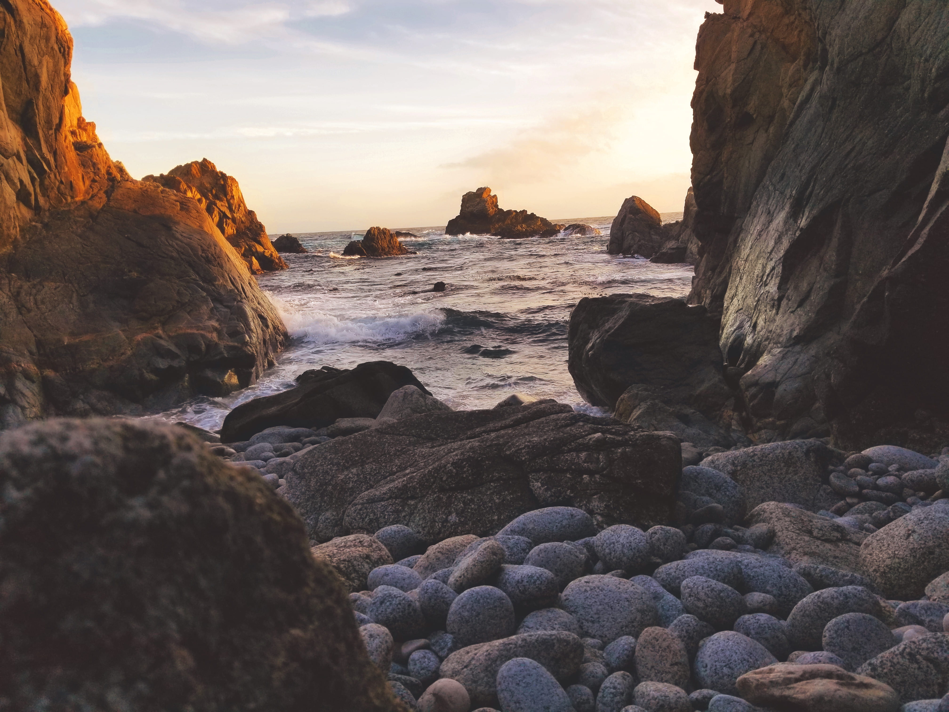 beauty in nature, motion, 4K, pebble, coast, sky, monterey, sunset, cliff, stones, rock - object, sore, sea, mountain, rock, tranquil scene, coastline, HD Wallpaper