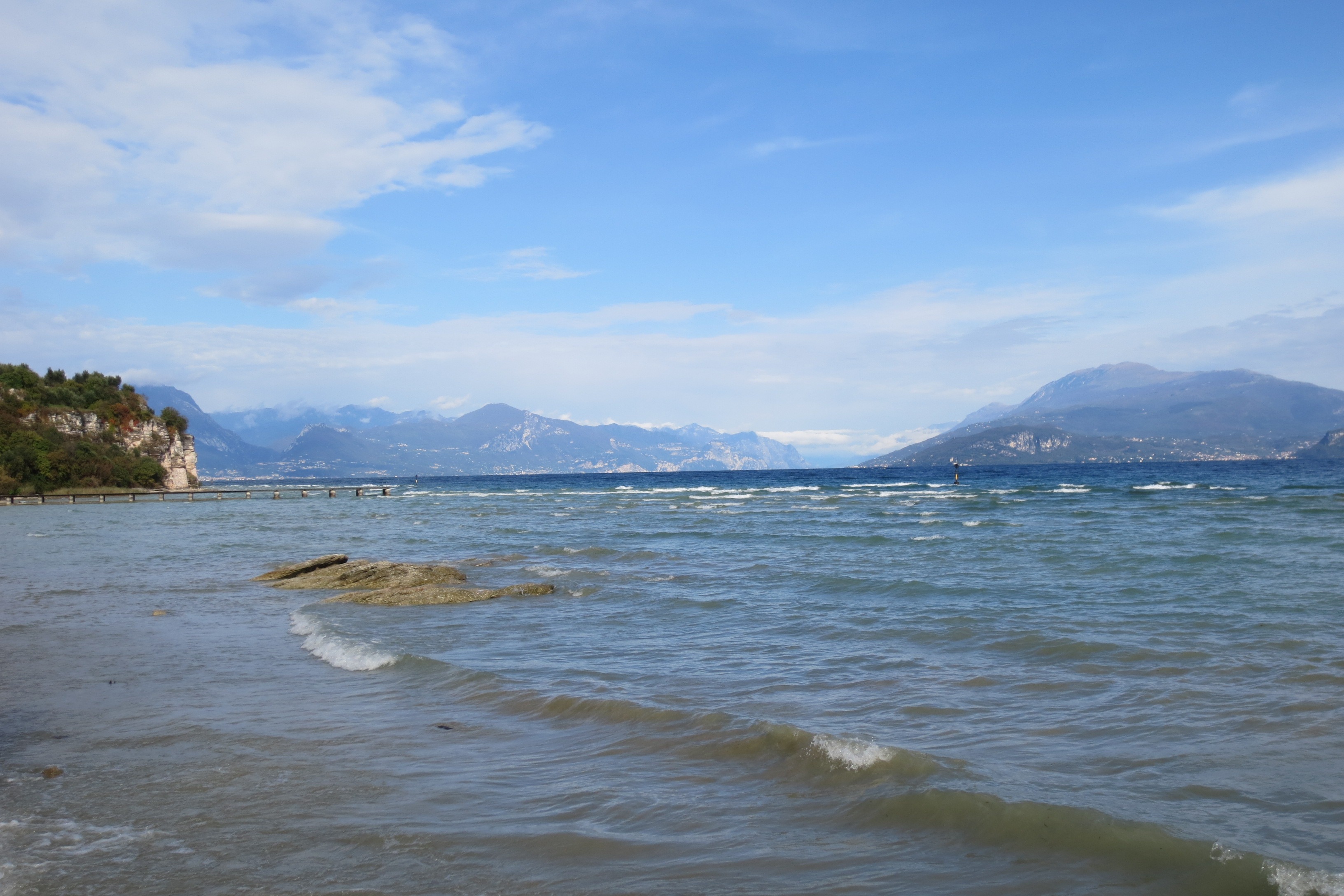 non-urban scene, day, idyllic, beach, no people, wave, sky, garda, beauty in nature, land, mountain range, mountain, tranquil scene, scenics - nature, lake, HD Wallpaper