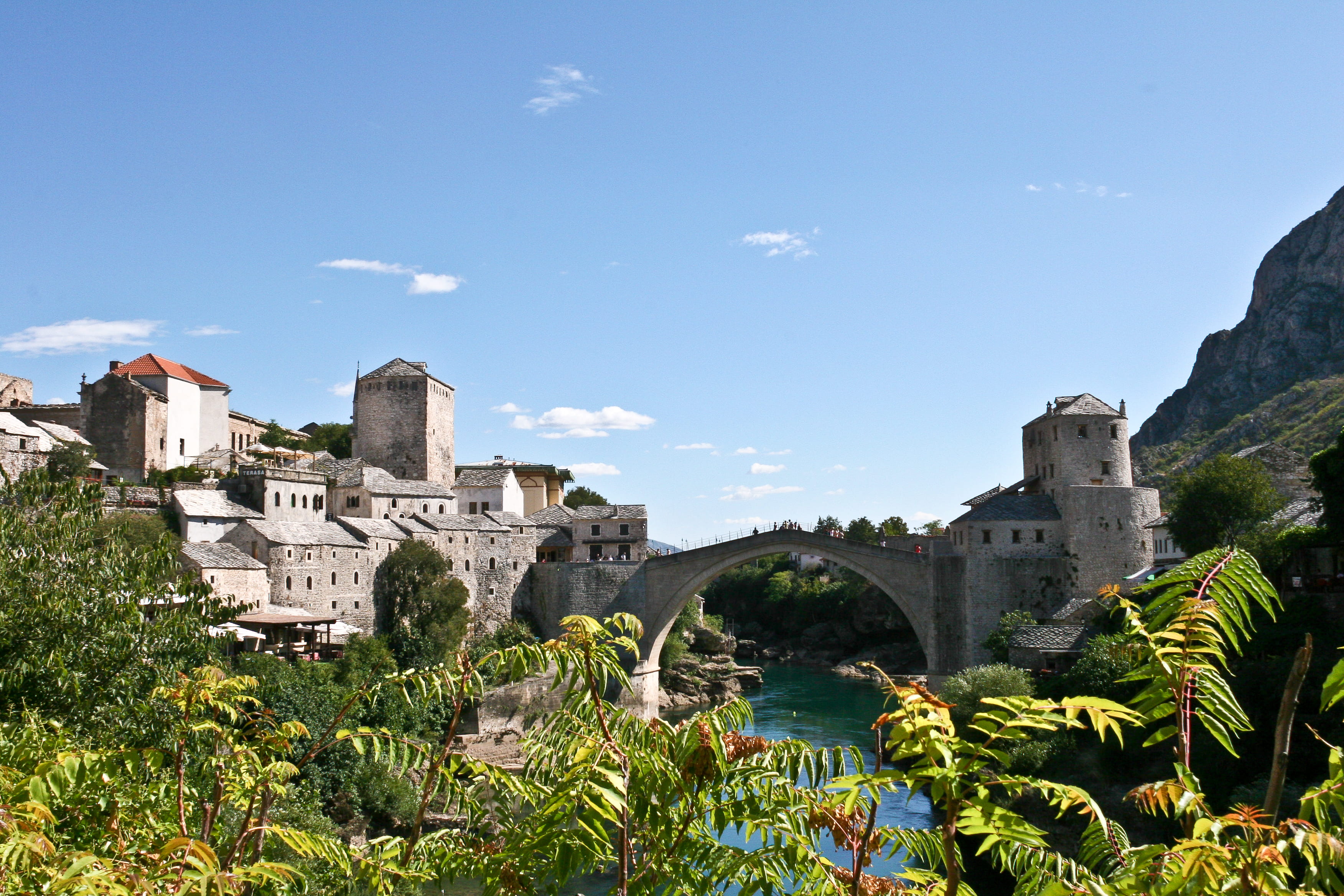 tree, bosnia, cloud - sky, growth, old, travel, blue, mostar, 2K, ancient civilization, travel destinations, built structure, day, town, history, sky, HD Wallpaper