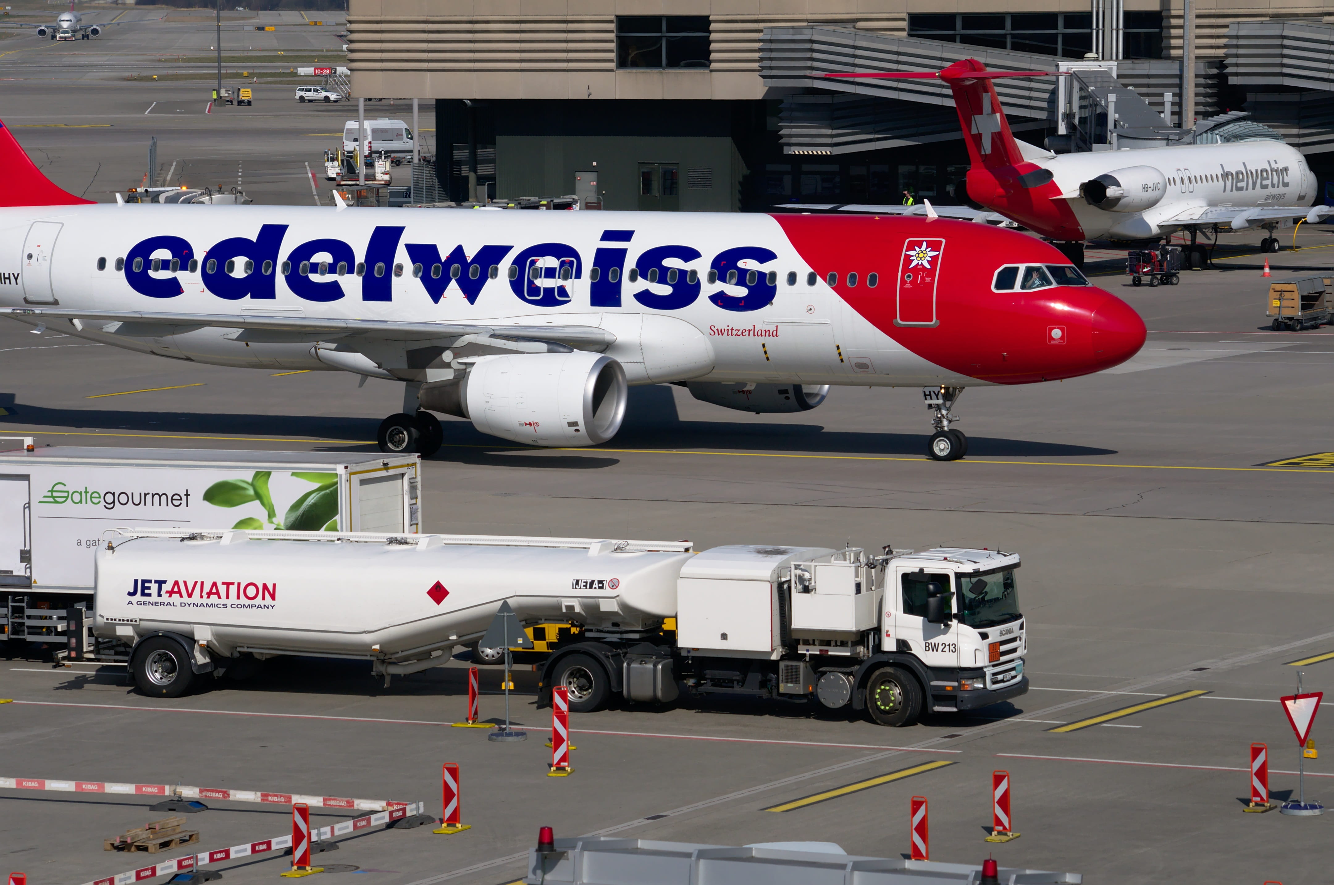 Aircraft, kerosene, 4K, airport runway, truck, travel, mode of transport, public transportation, real people, Edelweiss, air vehicle, land vehicle, tank vehicle, HD Wallpaper