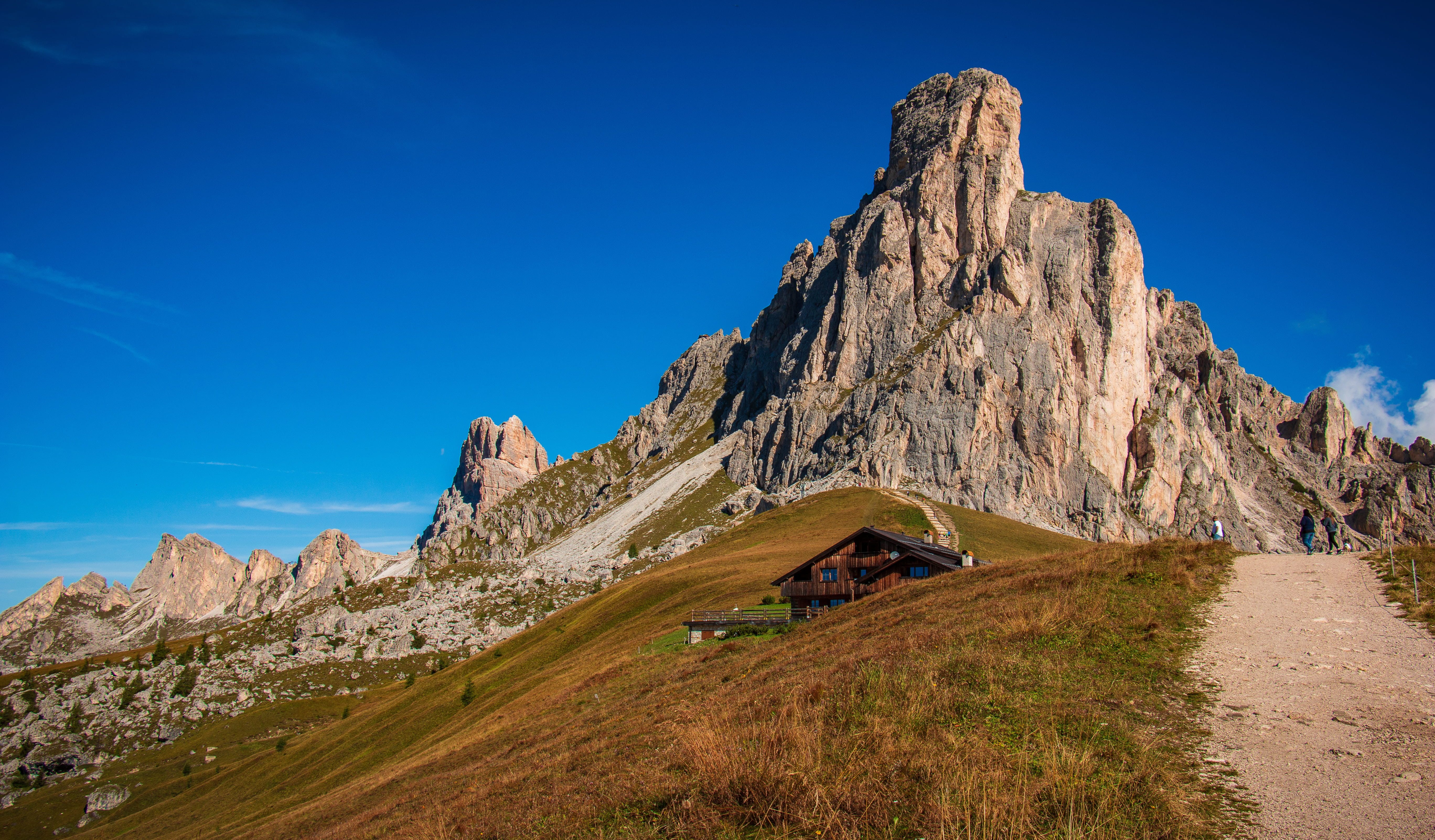 solid, rock - object, grass, sky, land, semi-arid, cliff, non-urban scene, mountain, giau, scenery, housing, slope, blu, rock, building, no people, tranquil scene, HD Wallpaper