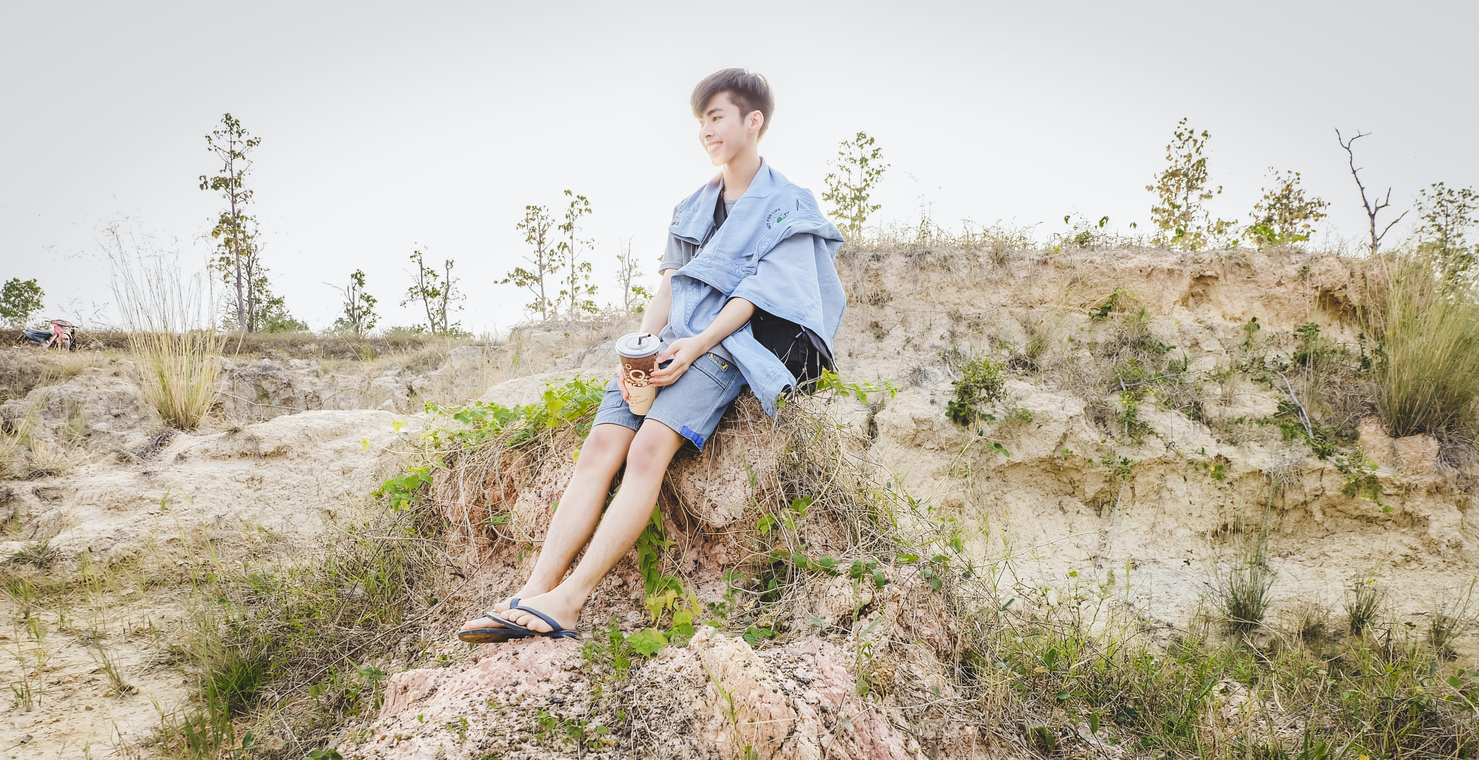 full length, day, one person, women, sitting, plant, sky, thailand, casual clothing, outdoors, land, lifestyles, tranquility, contemplation, leisure activity, HD Wallpaper