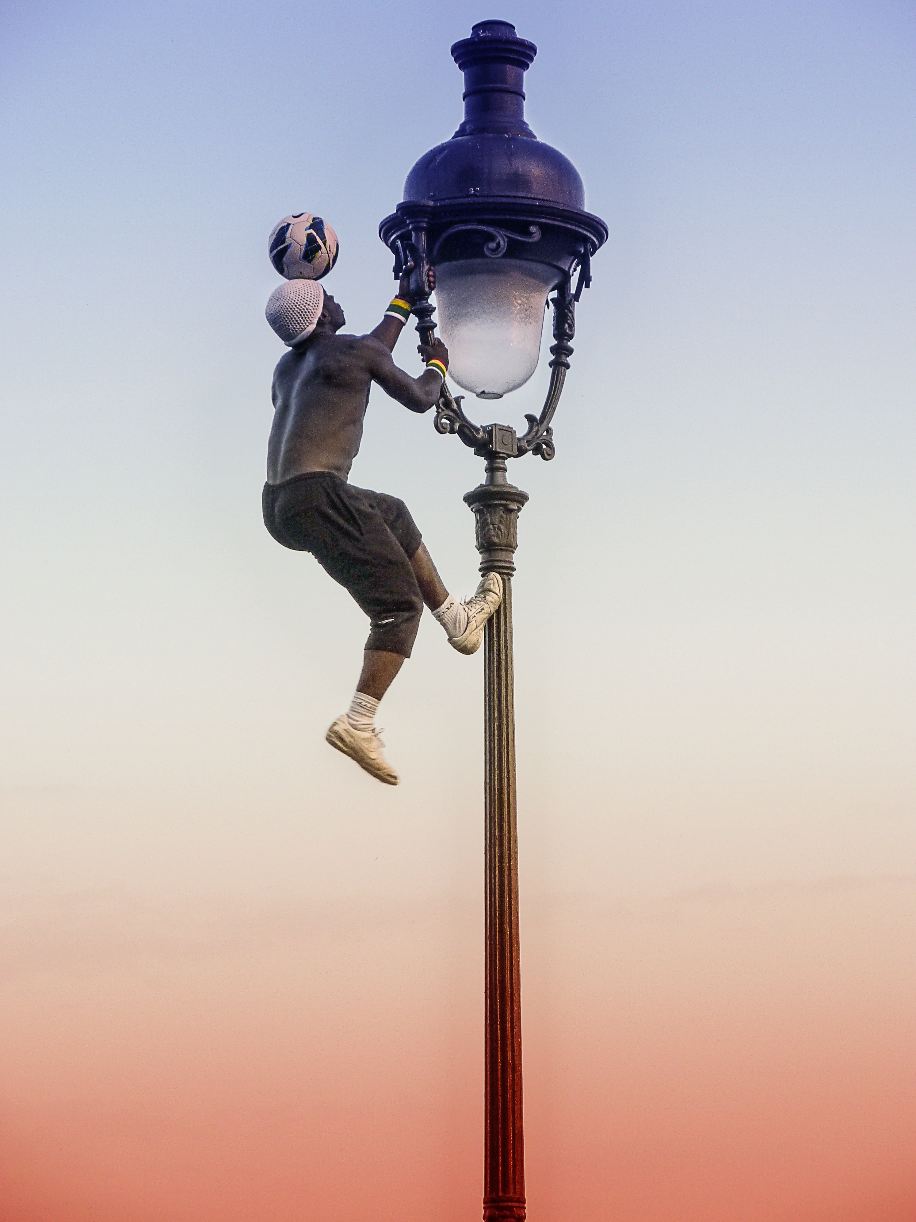 wearing, france, males, evening, sky, 4K, one person, pawn, street art, lighting equipment, men, european championship, pole, technology, paris, man, full length, Phone HD Wallpaper
