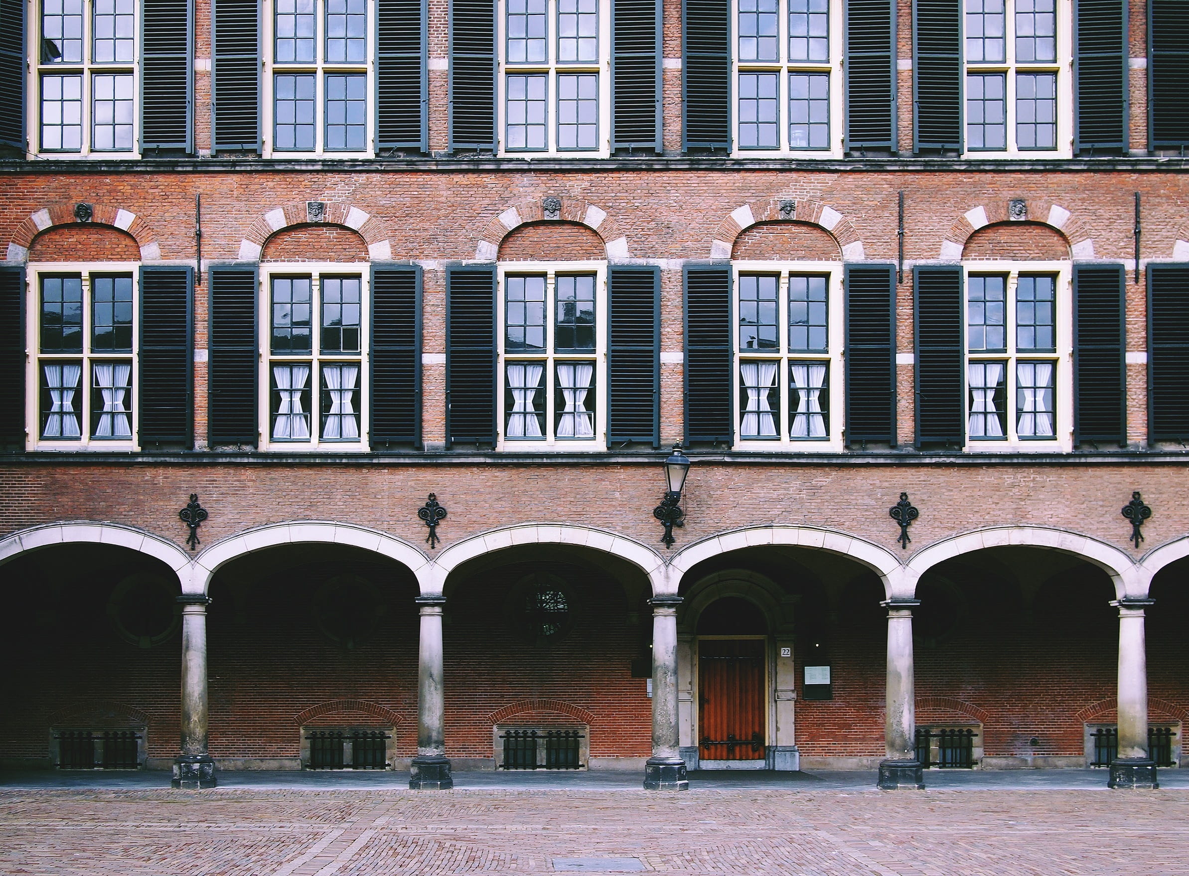 arched, no people, cobblestone, repetition, daytime, building, windows, netherlands, wall, built structure, brick, outdoors, the hague, arch, location, HD Wallpaper