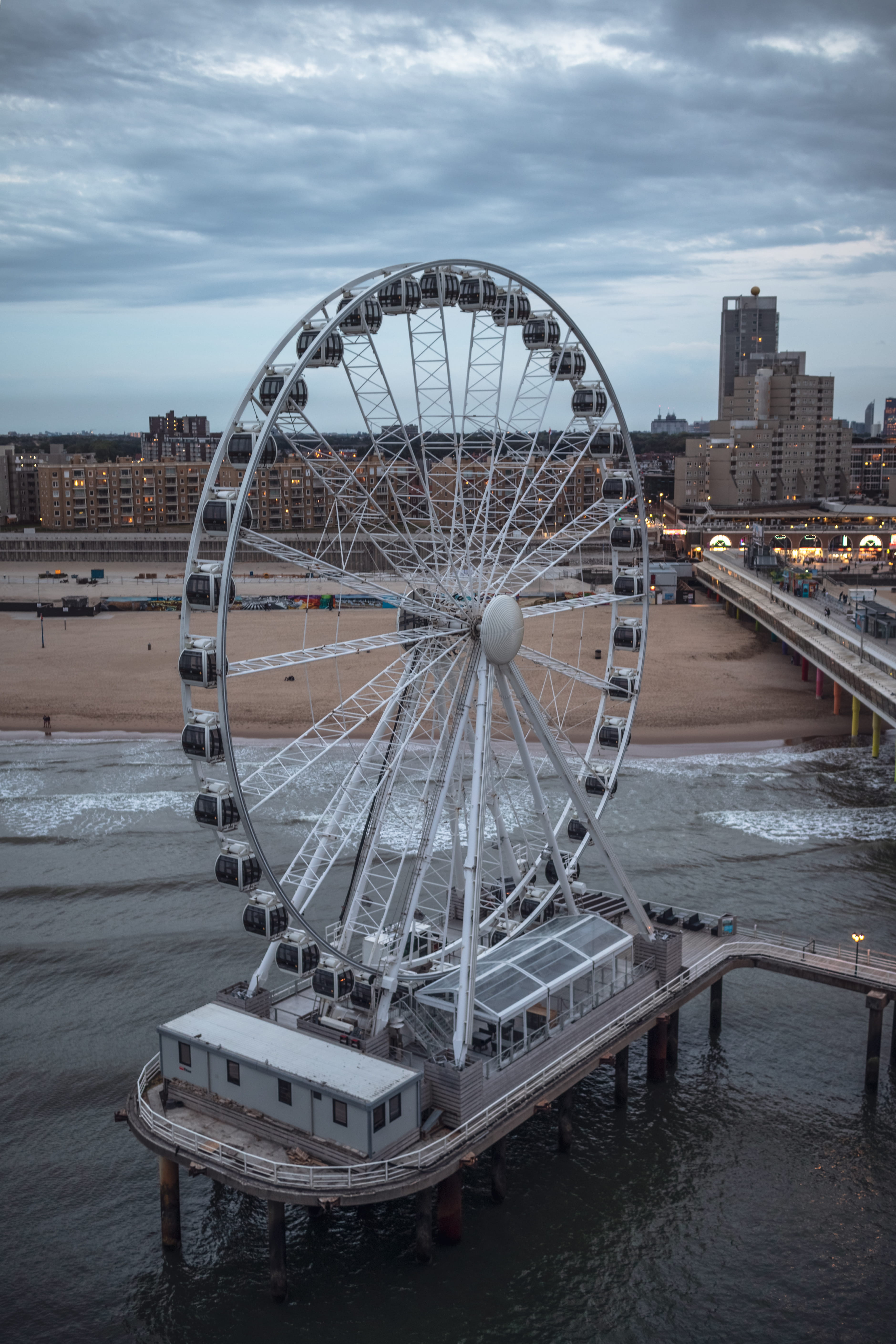 ferris wheel, amusement park ride, ocean, nautical vessel, scheveningen, nature, river, beach, amusement park, lights, sky, outdoors, evening, 5K, netherlands, Phone HD Wallpaper
