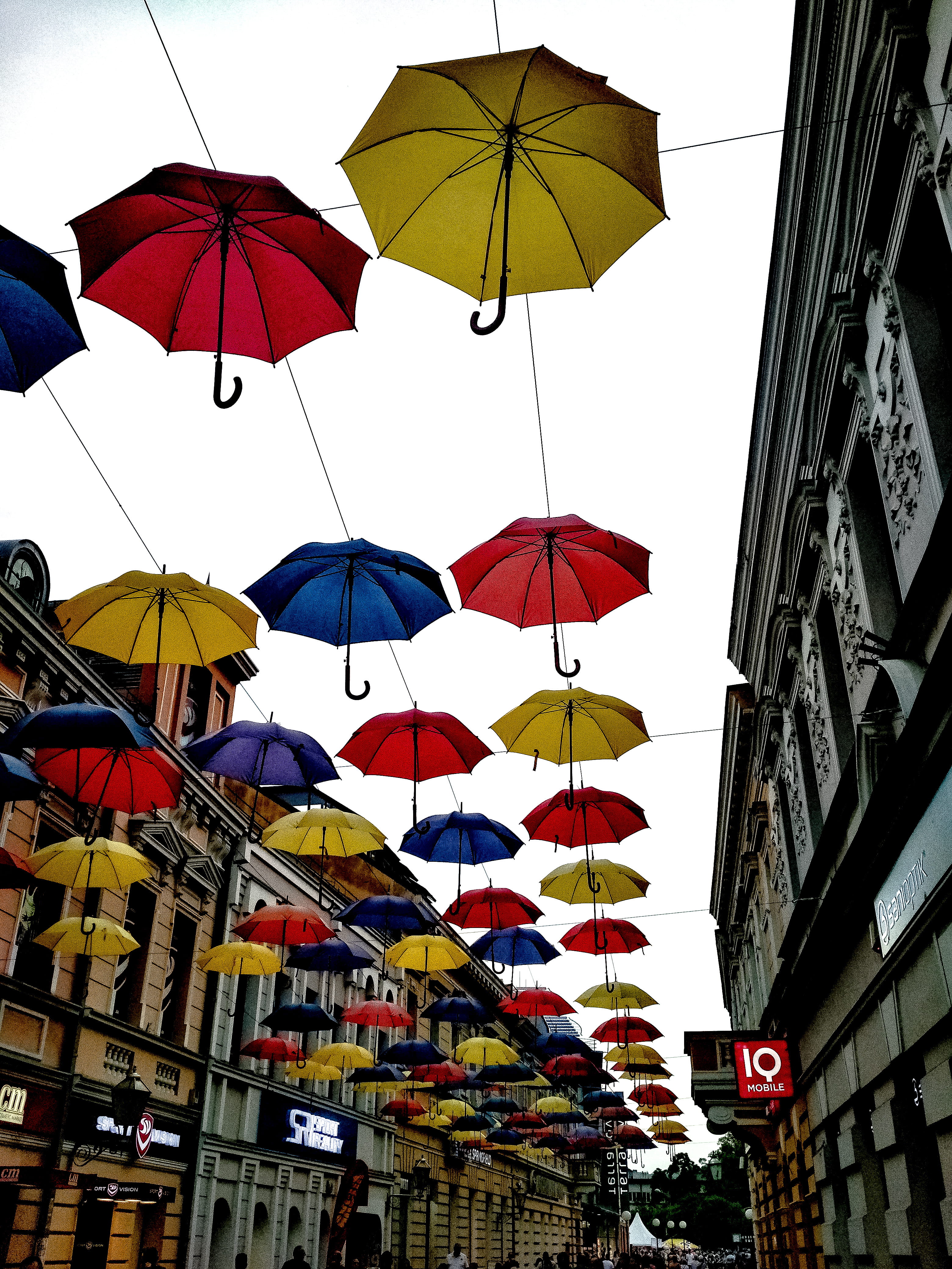 decorative, outdoors, city, umbrella, hanging, colors, life, protection, red, banja luka, multi colored, building, no people, adventure, building exterior, Phone HD Wallpaper