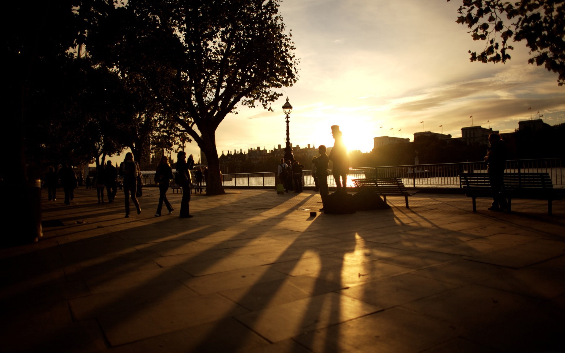 lifestyles, outdoors, plant, 1080P, silhouette, railing, men, promenade, orange color, nature, sunlight, architecture, sky, people, tree, city, group of people, HD Wallpaper