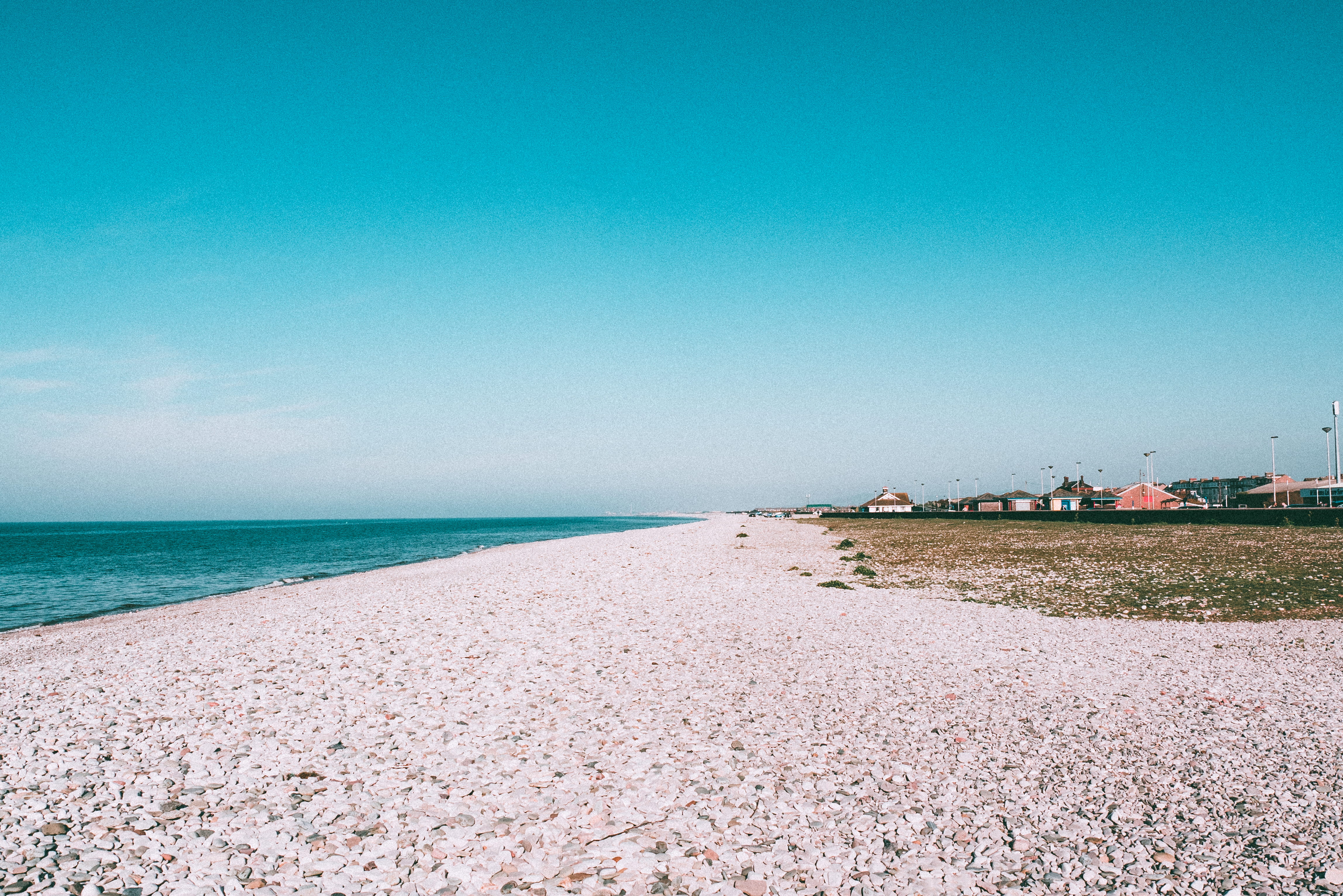 4K, tranquility, beauty in nature, sky, no people, daytime, coast, horizon over water, land, blue, summer, stones, ocean, oceanside, seaside, pebbles, HD Wallpaper