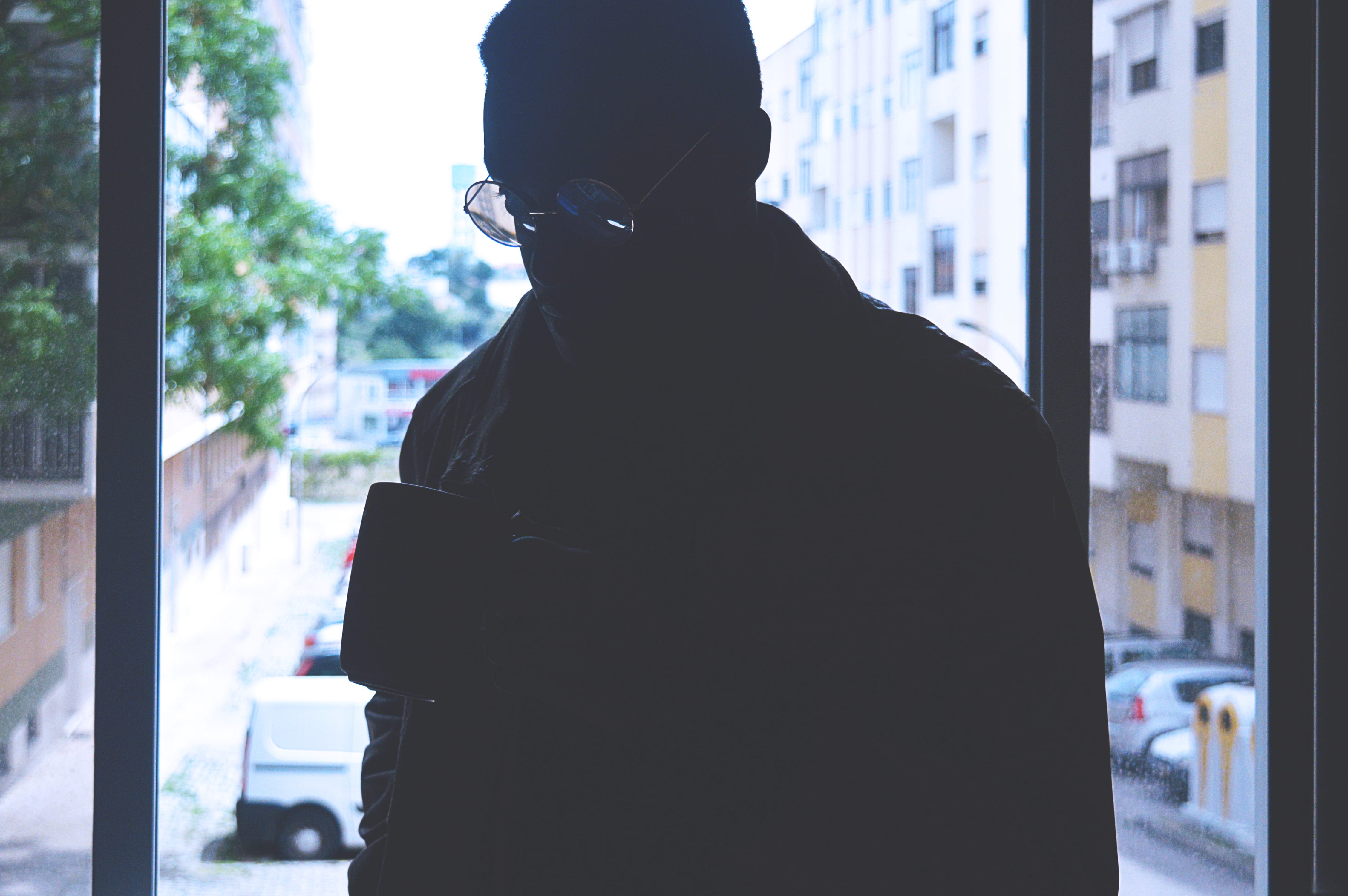 round glasses, amora, focus on foreground, light, mask, rear view, dark, standing, headshot, men, home, silhouette, obscured face, day, 4K, city, lifestyles, HD Wallpaper