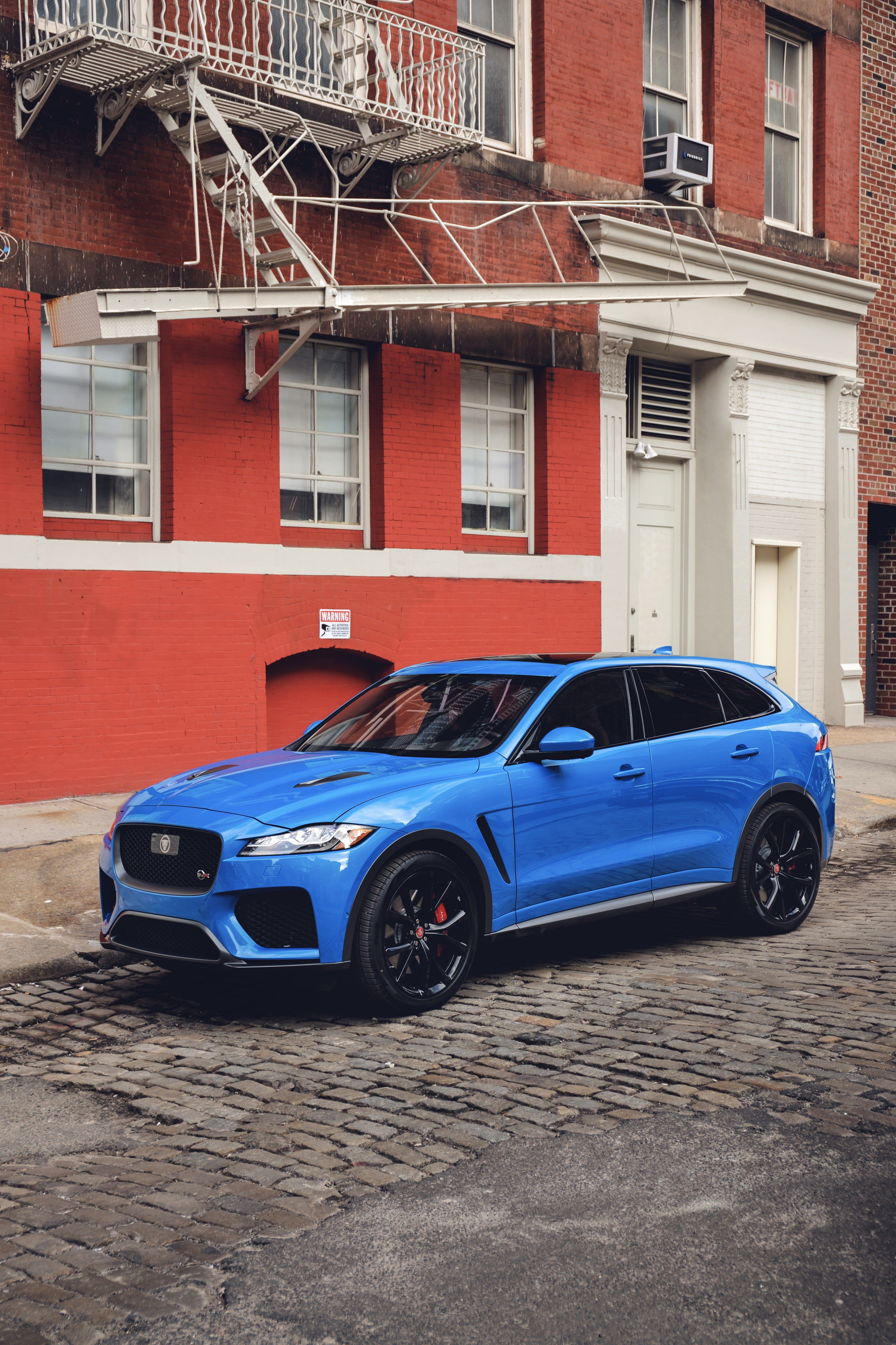 residential district, land vehicle, architecture, no people, vintage car, svr, red, city, 4K, parking, motor vehicle, jaguar, wheel, built structure, sports car, Phone HD Wallpaper