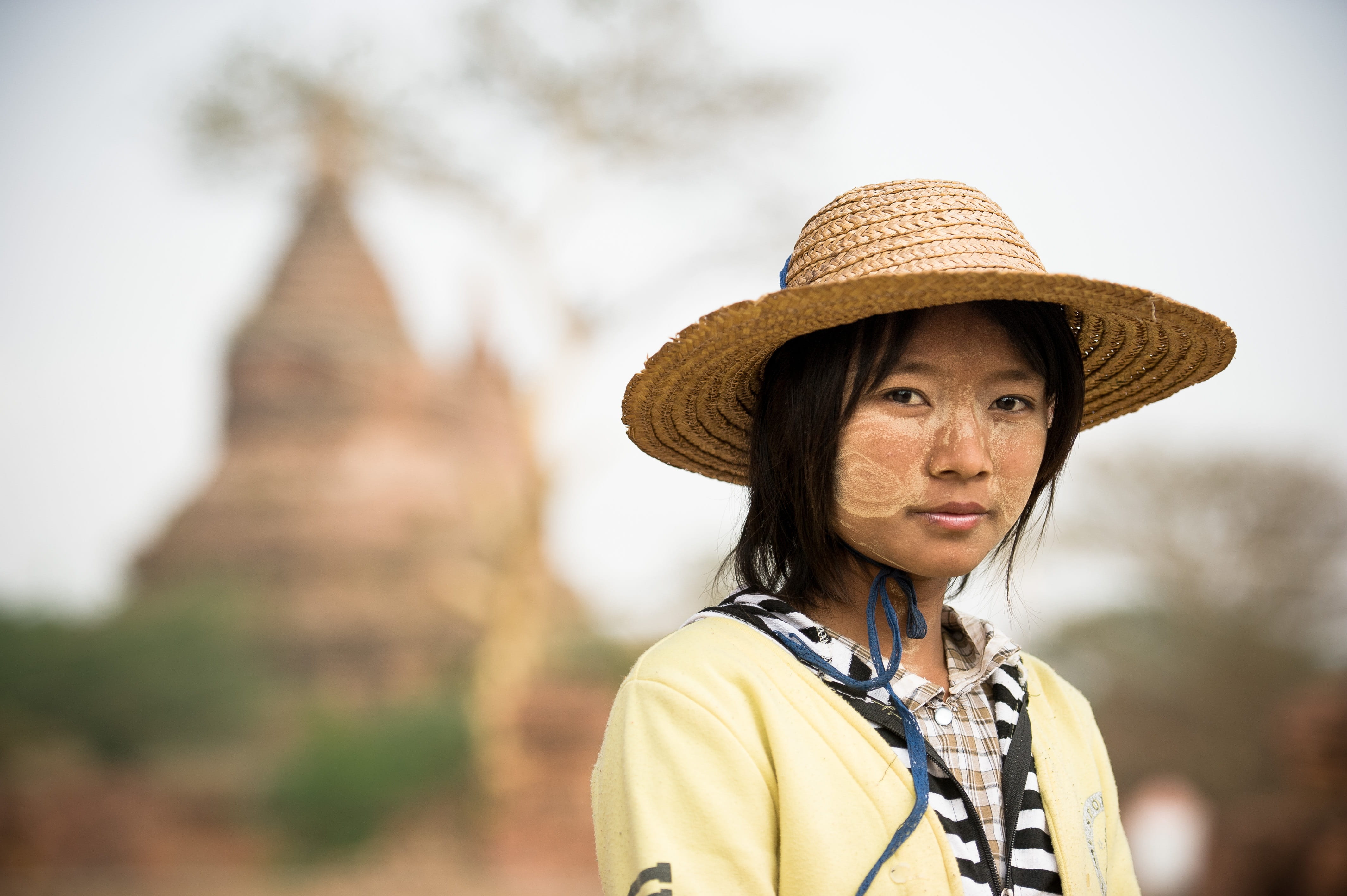 females, woman, culture, looking at camera, archaeological, temple, hat, young adult, asia, one person, hairstyle, buddhism, day, pagoda, outdoors, bagan, HD Wallpaper