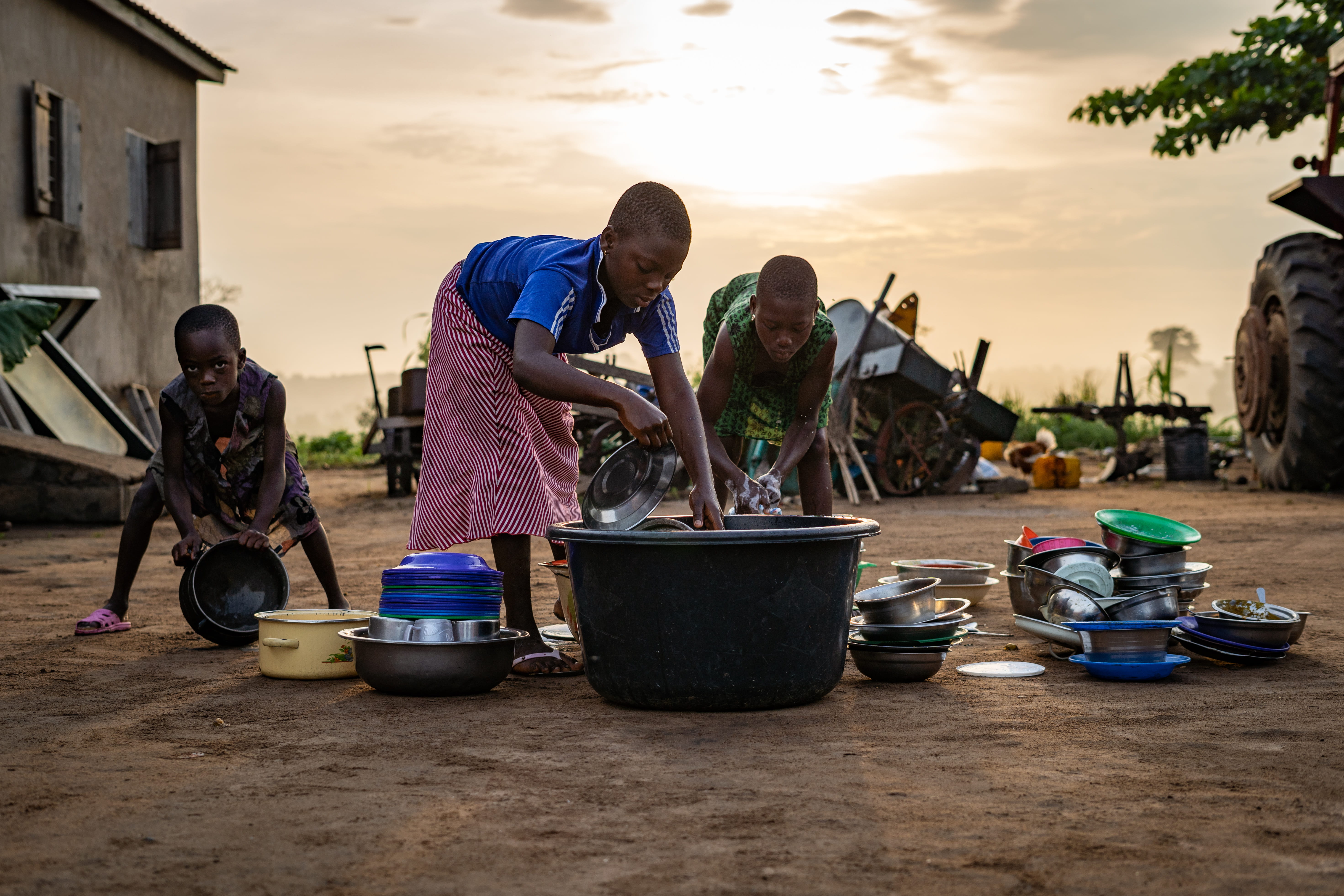 bending, people, day, dishes, poor, full length, males, african, children, young men, mature adult, cleaning, sky, young adult, togo, casual clothing, child, HD Wallpaper