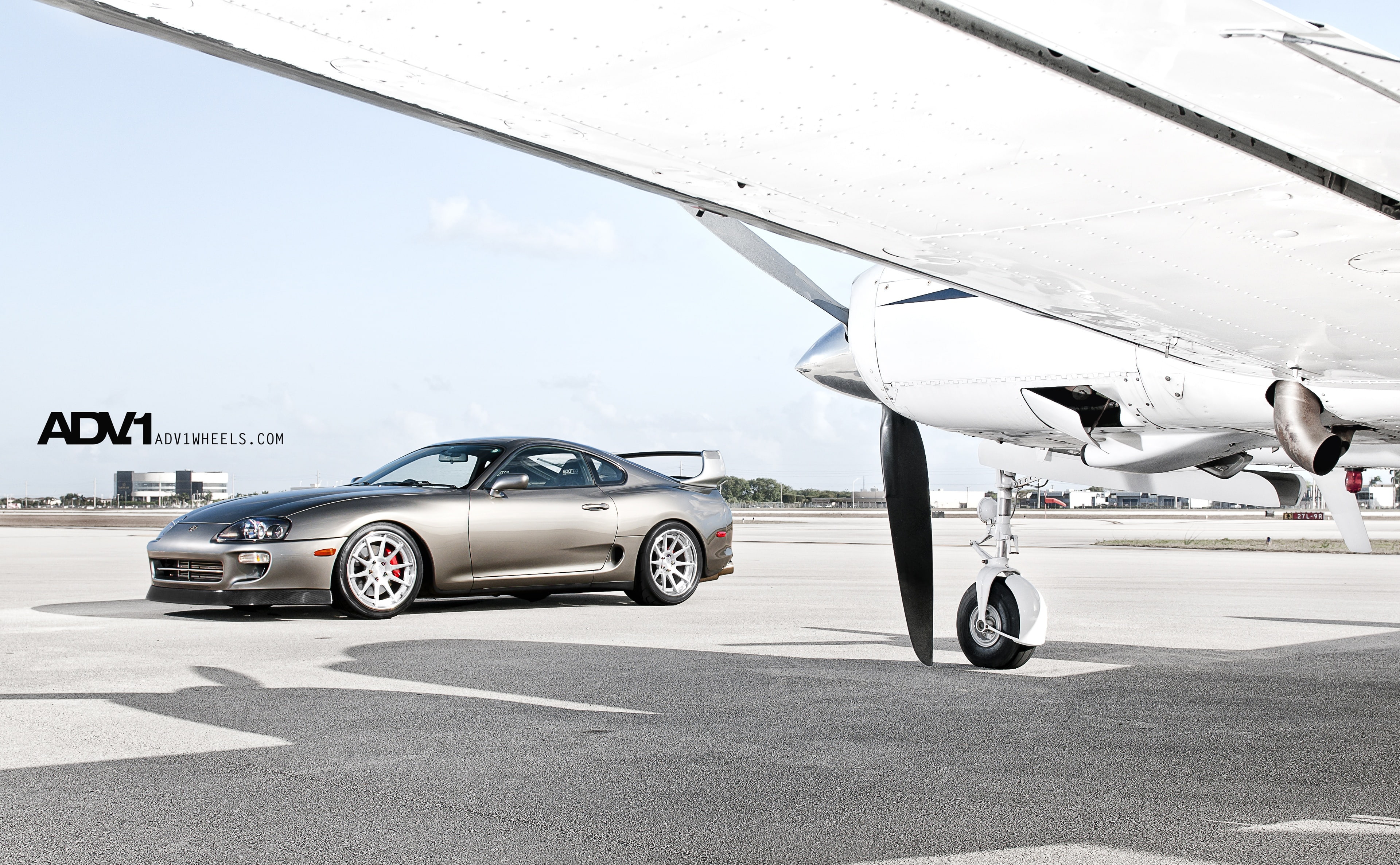 airport runway, advance, car, land vehicle, Cars, outdoors, airplane, coupe, supra, motor vehicle, mode of transportation, 4K, no people, airport, wheels, HD Wallpaper
