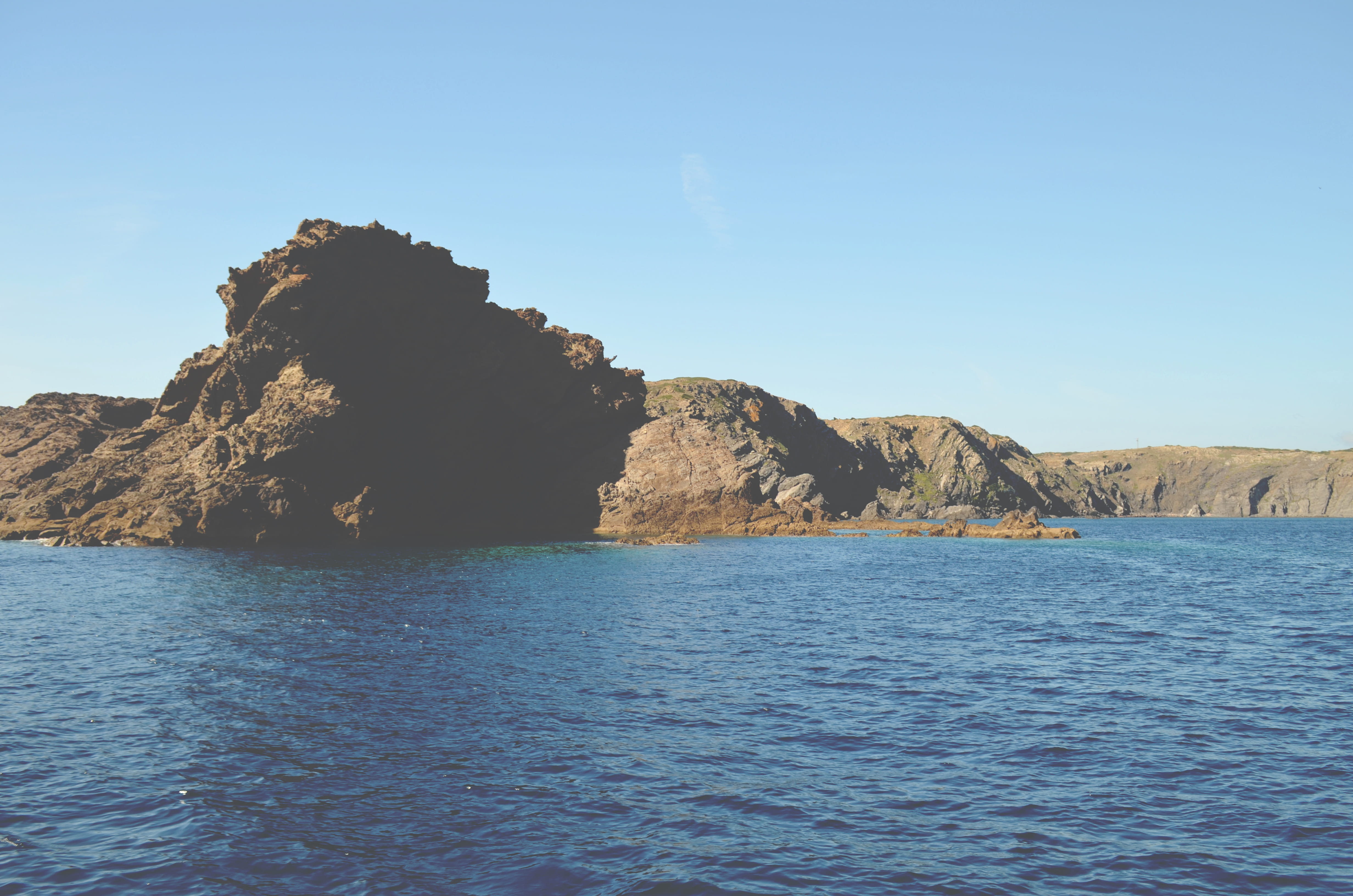 tranquility, blue, waterfront, view into land, tranquil scene, idyllic, clear sky, eroded, stack rock, formation, day, rock - object, beauty in nature, HD Wallpaper