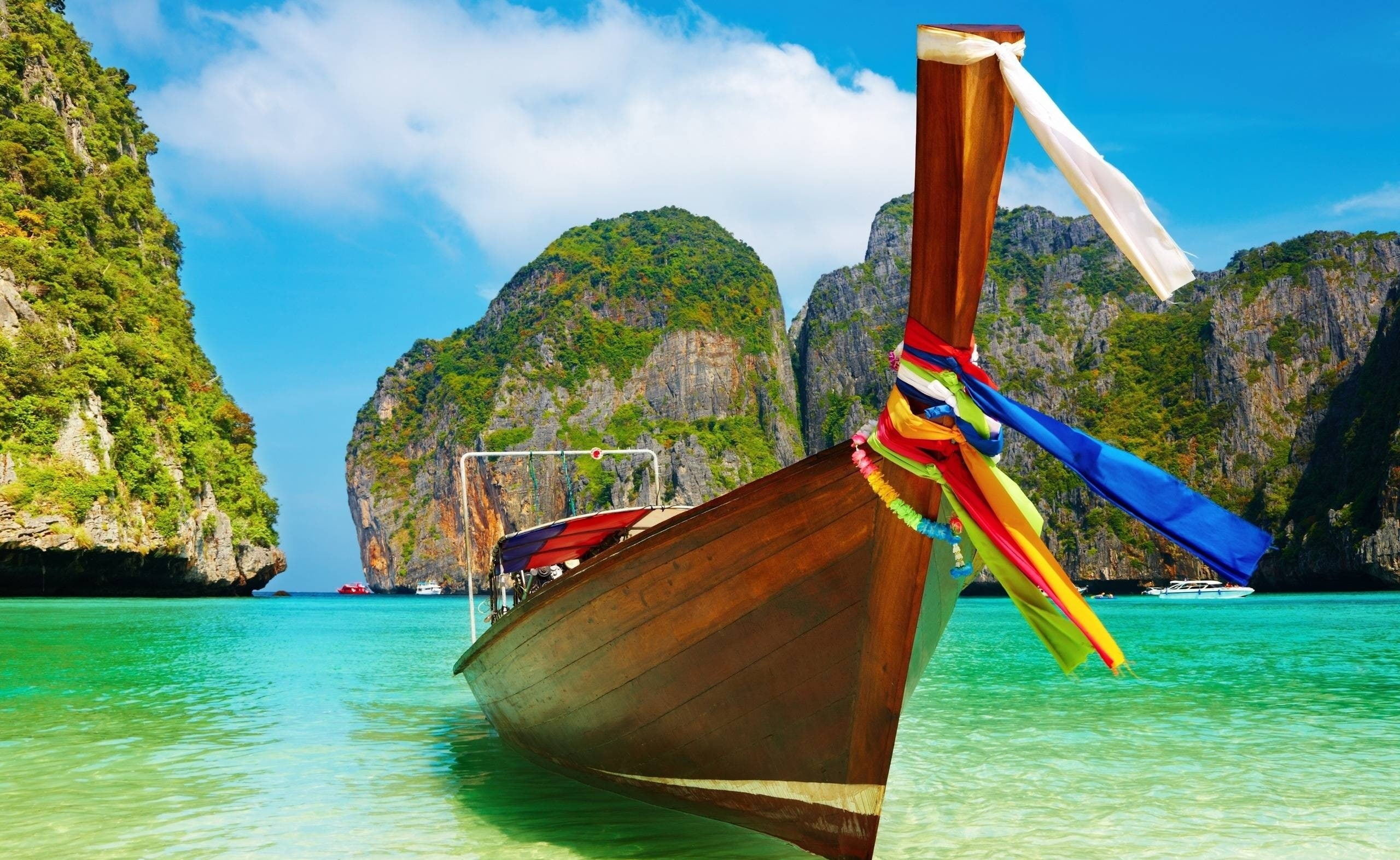 Ocean, mountain, seashore, longtail boat, Beach, tranquility, turquoise colored, day, sea, mountain range, beaches, tranquil scene, Lagoon, outdoors, Exotic, HD Wallpaper