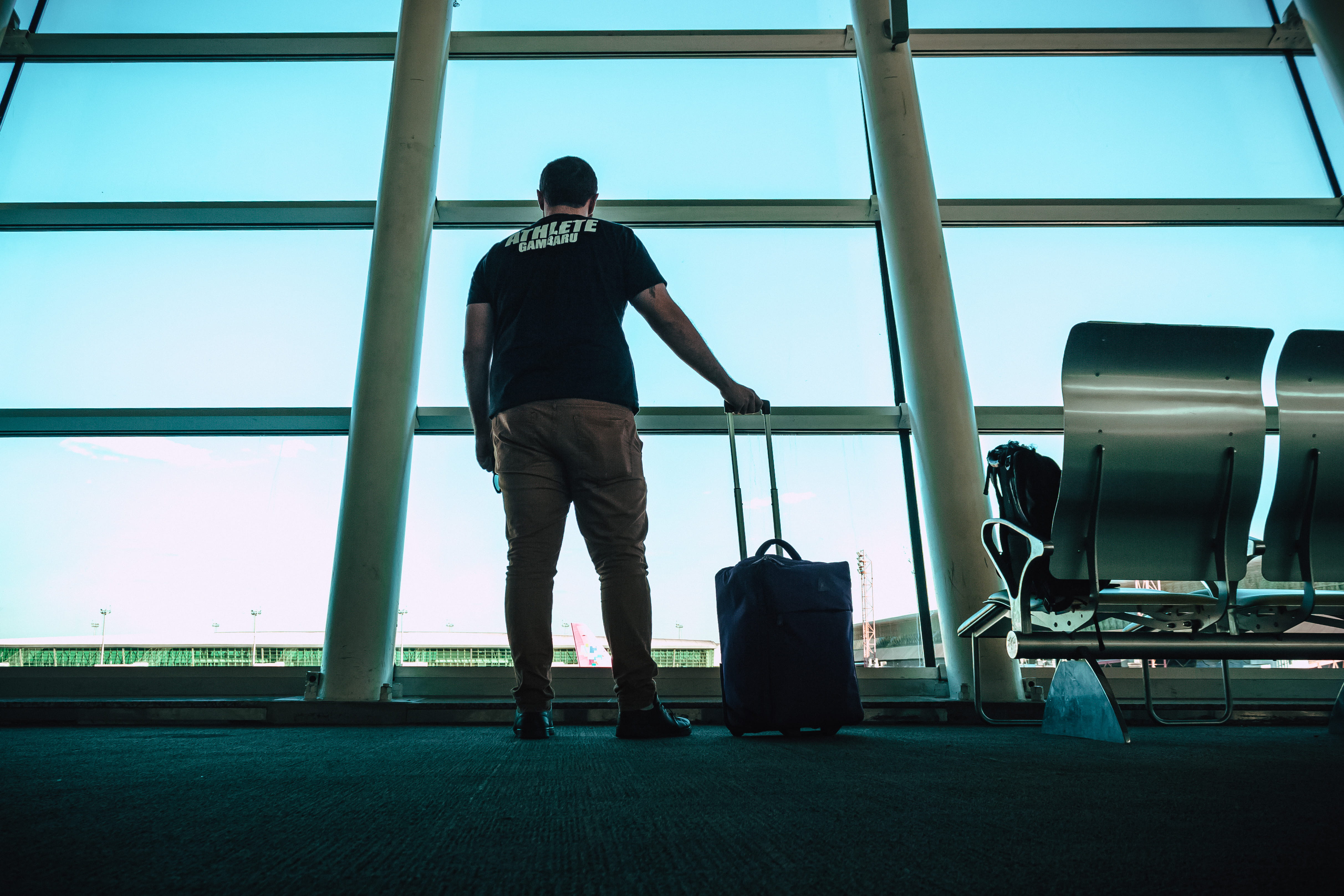 city, lounge, day, air vehicle, real people, glass - material, seat, urban, light, man, travel, holding, person, royalty  images, departure, building, lounge chairs, HD Wallpaper