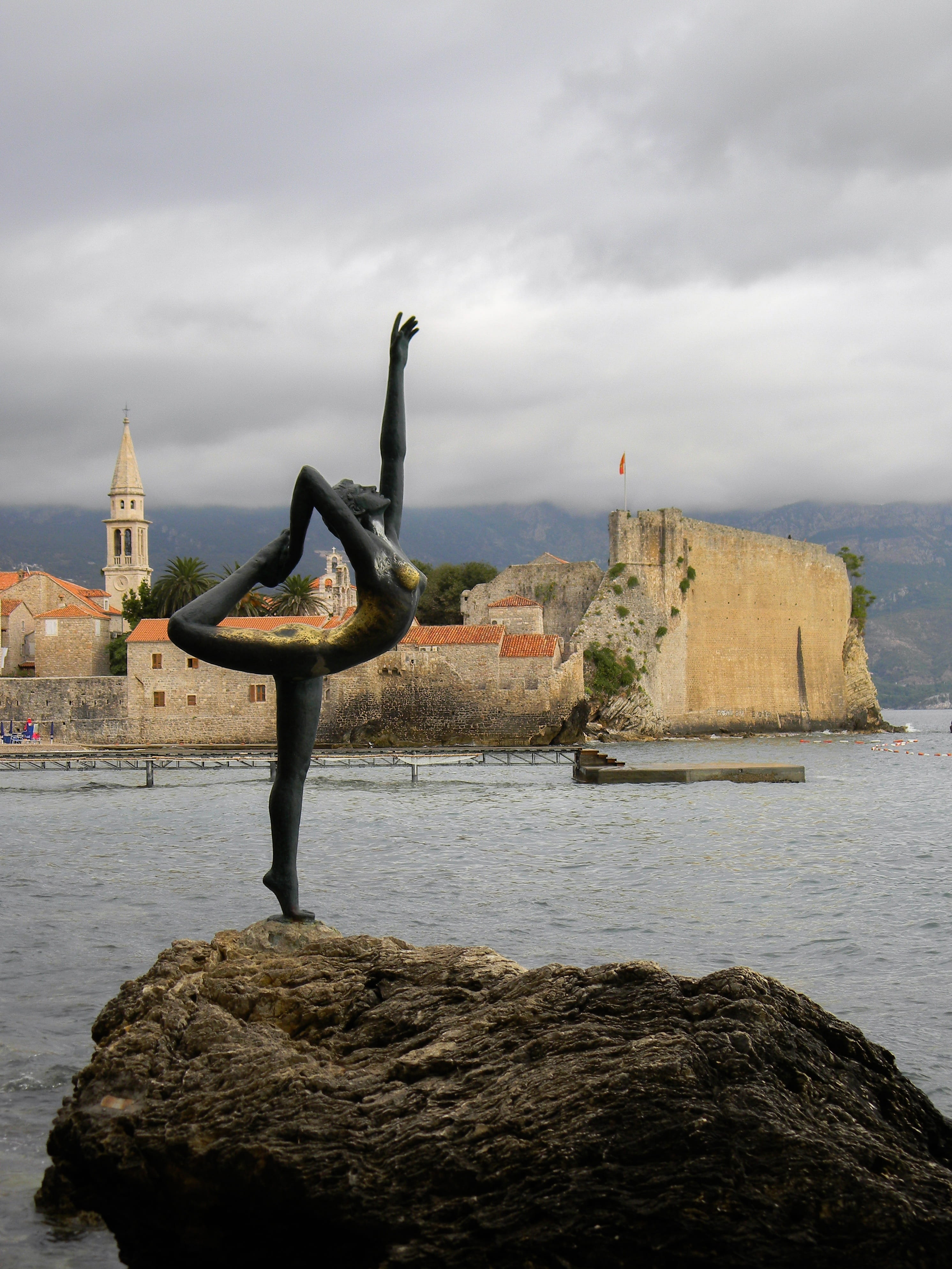 coast, girl, nature, architecture, clouds, outdoors, partly cloudy, bay, montenegro, mermaid, no one, water, marina, sky, solid, built structure, rock - object, Phone HD Wallpaper