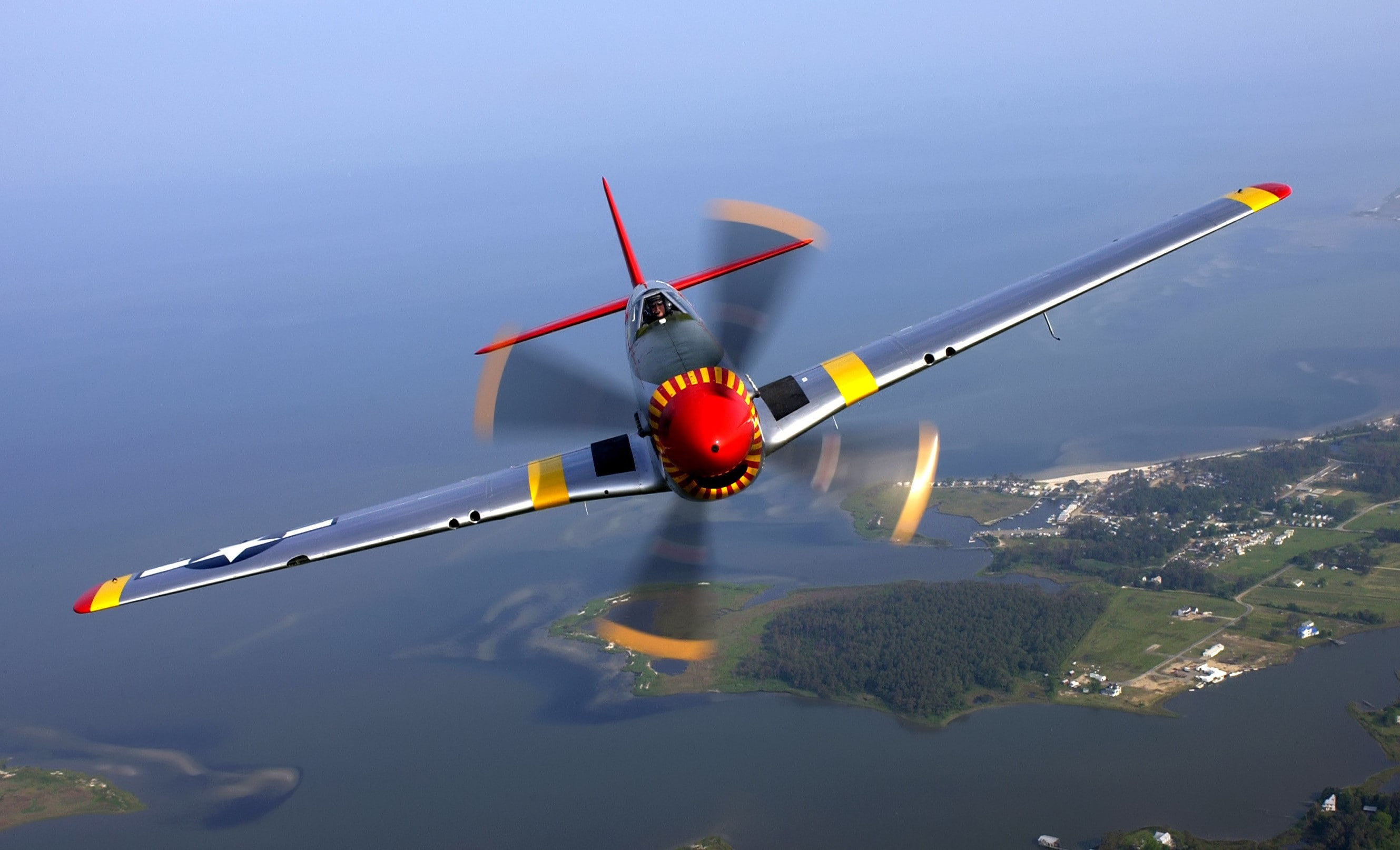motion, mode of transportation, air vehicle, nature aerial view airplane men pilot face helmet wings north american p 51 mustang flying propeller motion blur sea trees forest house aviator, HD Wallpaper