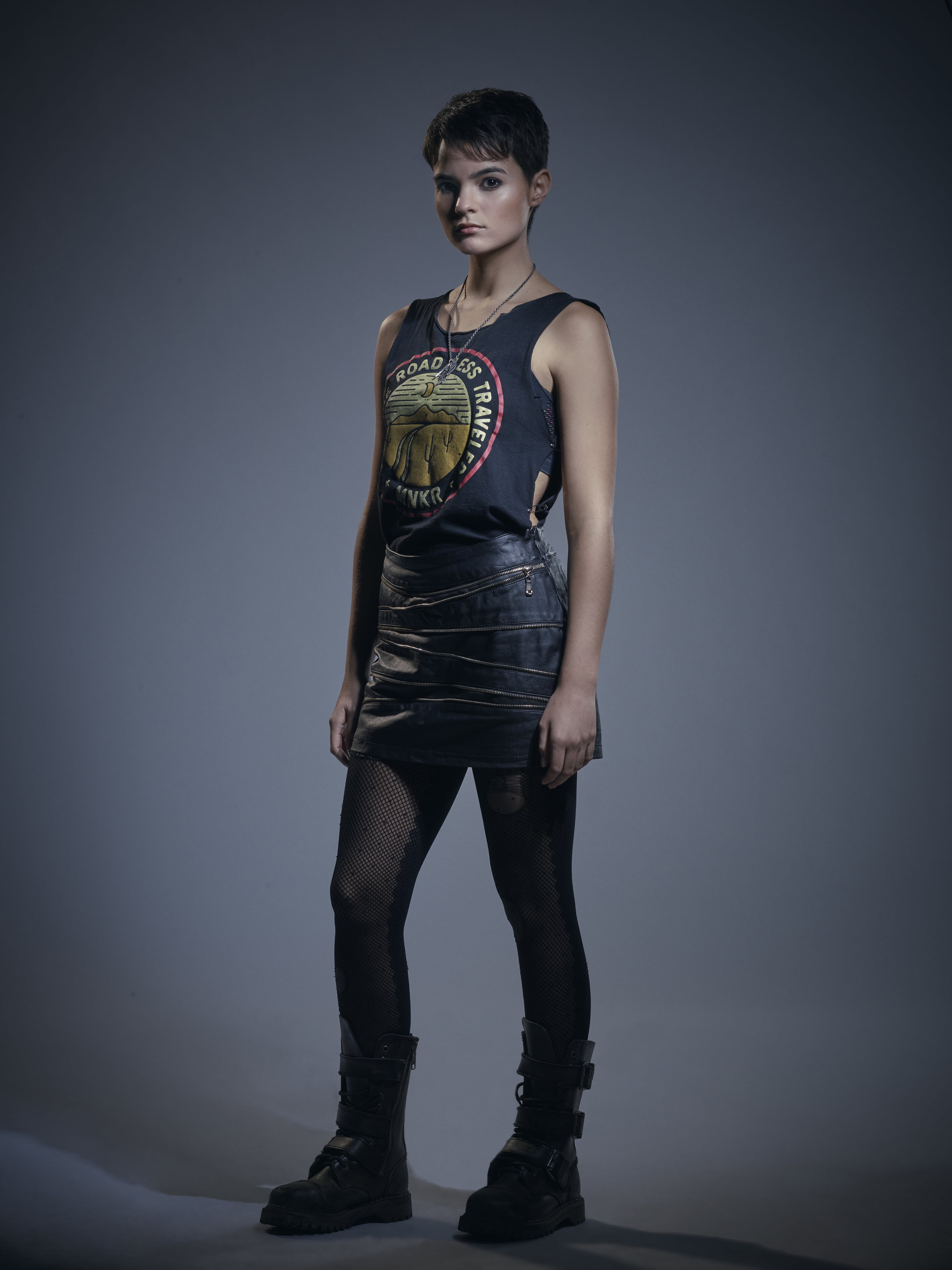 brunette, women, simple background, miniskirt, Brianna Hildebrand, actress, standing, dark hair, 4K, short hair, Phone HD Wallpaper