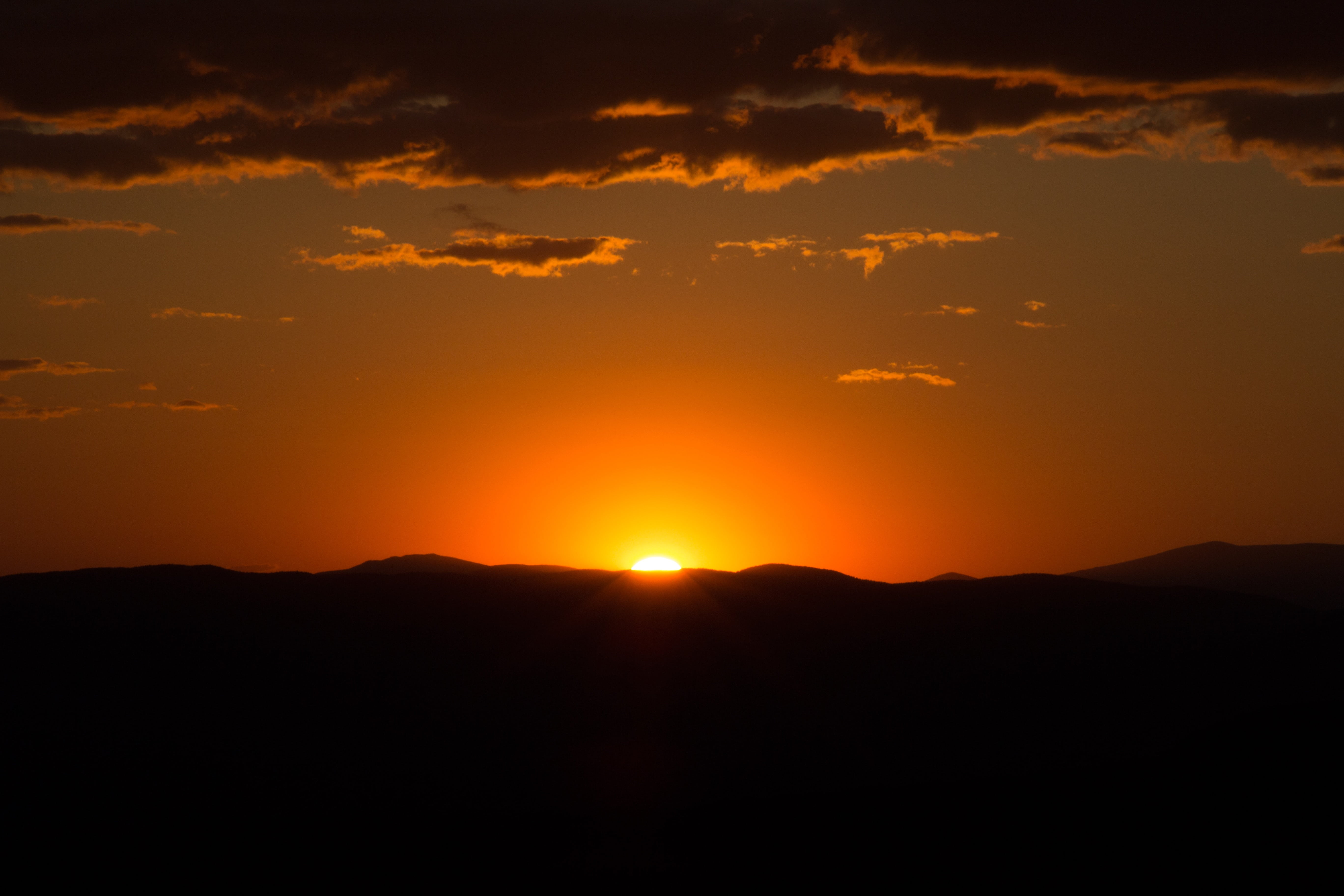 sun, peeping, clouds, nature, environment, silhouette, sunset, tranquil scene, sunlight, landscape, photography, scenics, mountains, mountain, yellow, no people, HD Wallpaper