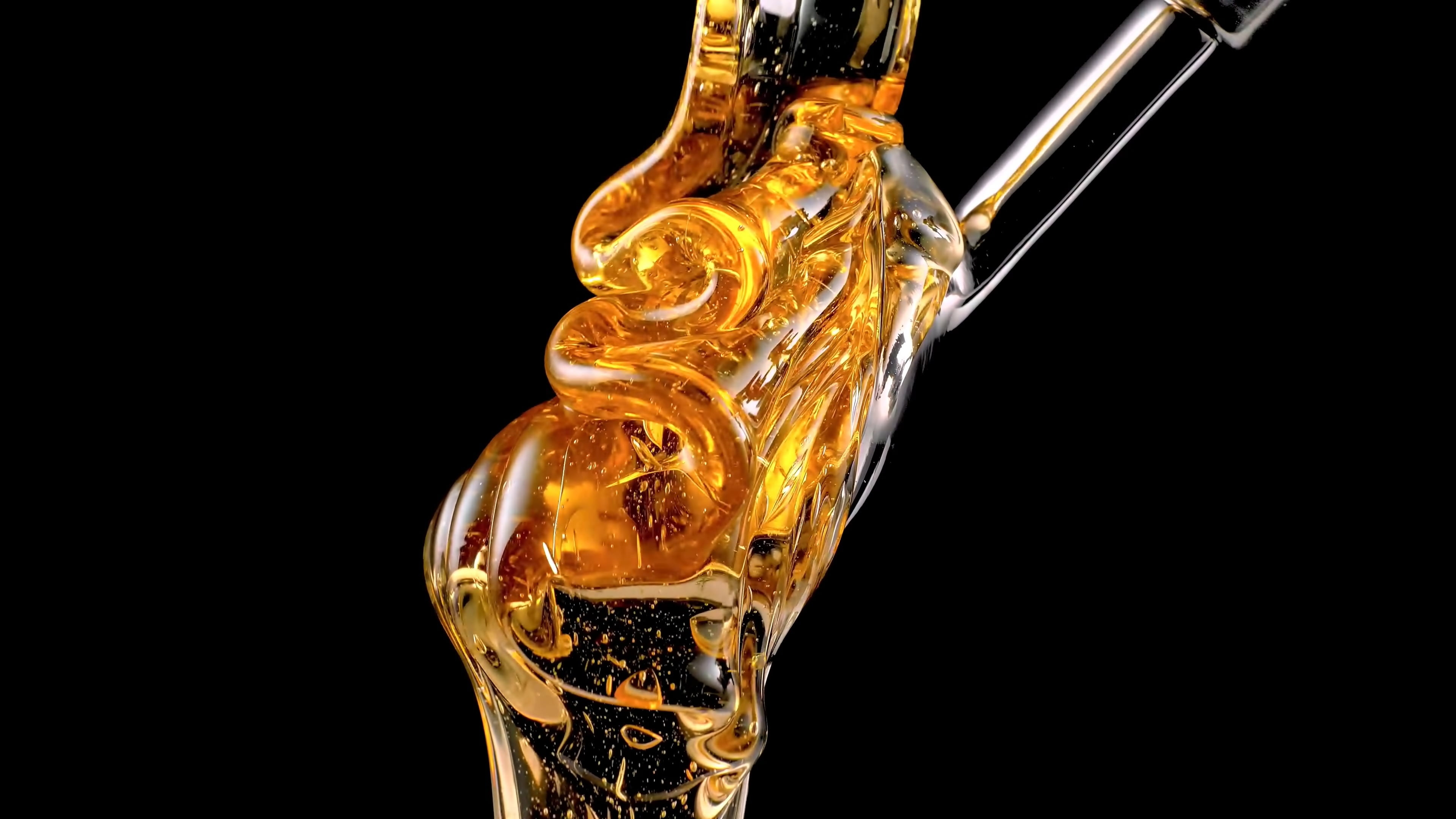 golden, gold colored, single object, liquid, honey, drink, drinking glass, pouring, black background, close-up, glass, gold, studio shot, refreshment, household equipment, HD Wallpaper