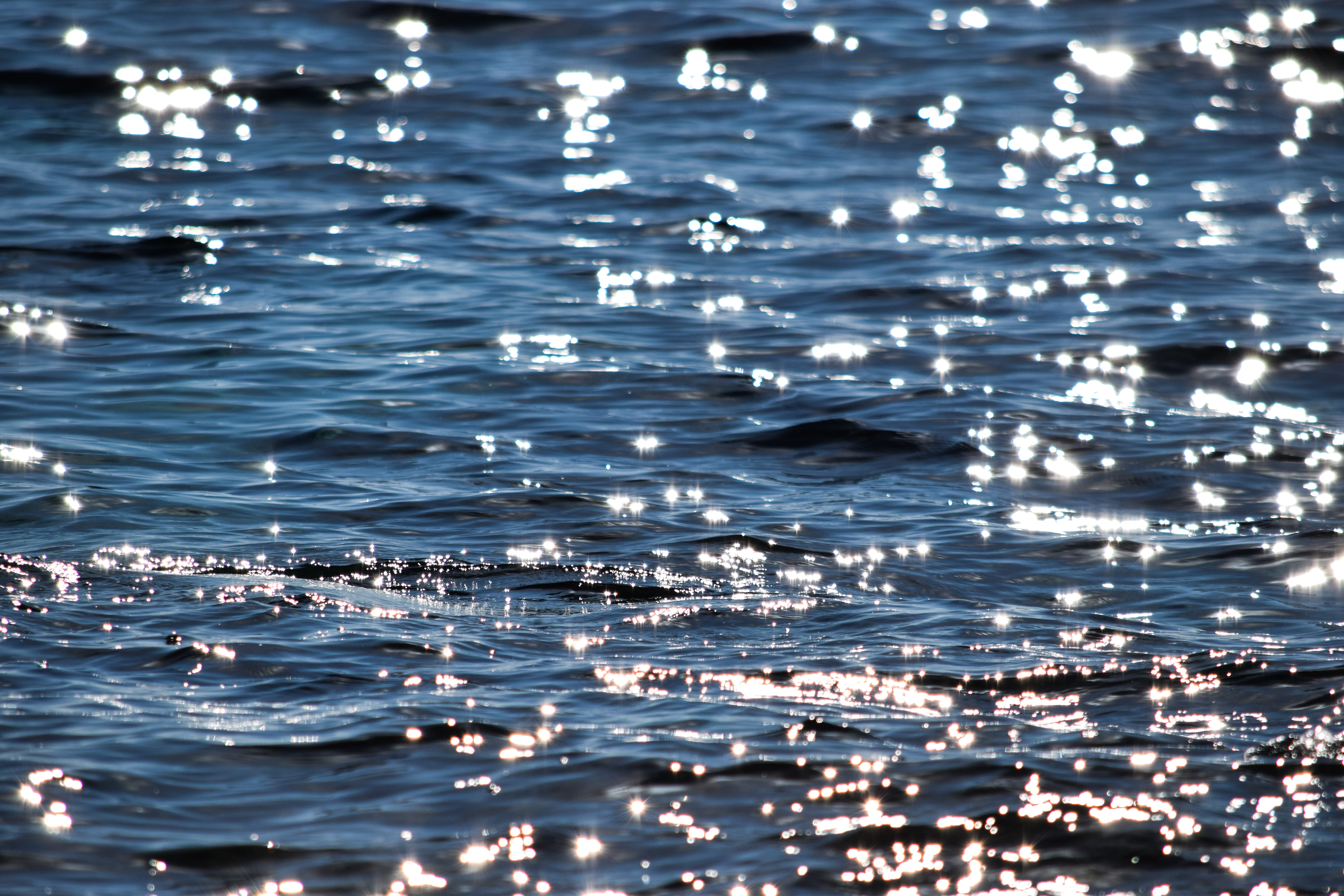no people, sunshine, shiny, motion, surface, selective focus, waterfront, reflection, sparkling, sunlight, rippled, full frame, day, beauty in nature, outdoors, HD Wallpaper