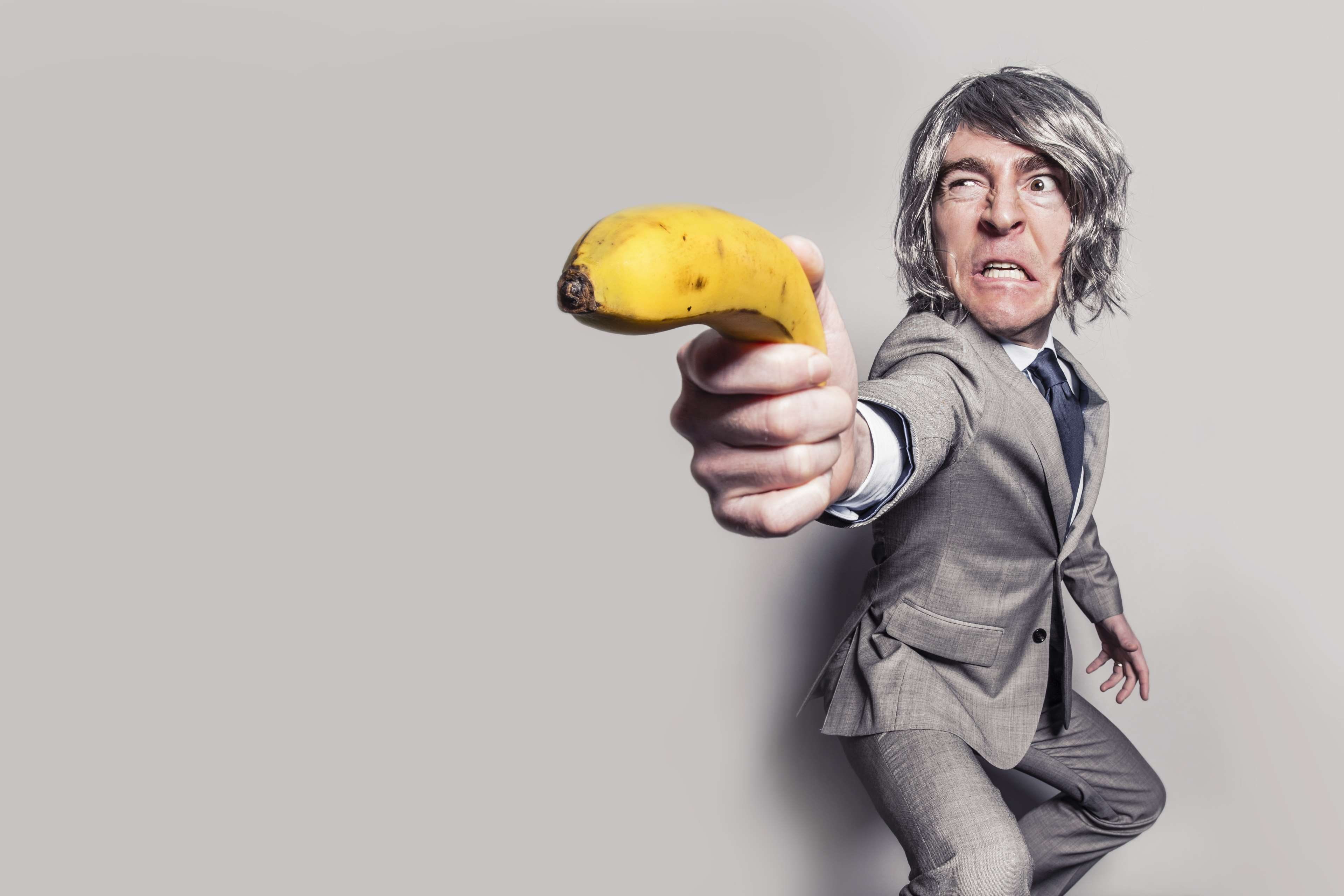 yellow, senior adult, formal, action, fun, hairstyle, 4K, arm, banana, eyes, standing, gray, necktie, copy space, smiling, one person, indoors, hands, HD Wallpaper