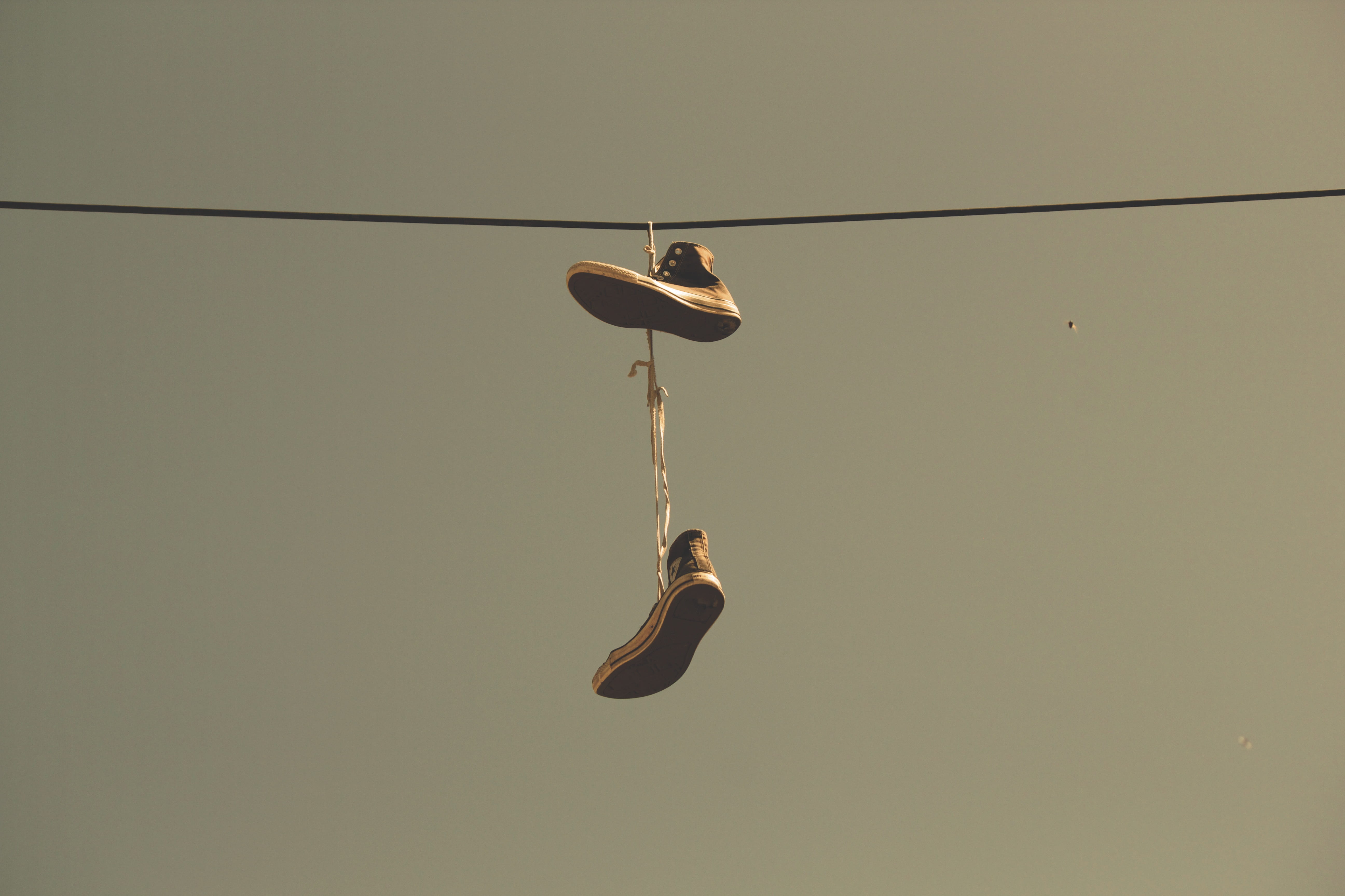5K, no people, nature, pair, studio shot, low angle view, sky, metal, clear sky, hanging, shoes, rope, laces, city, connection, outdoors, copy space, close-up, HD Wallpaper