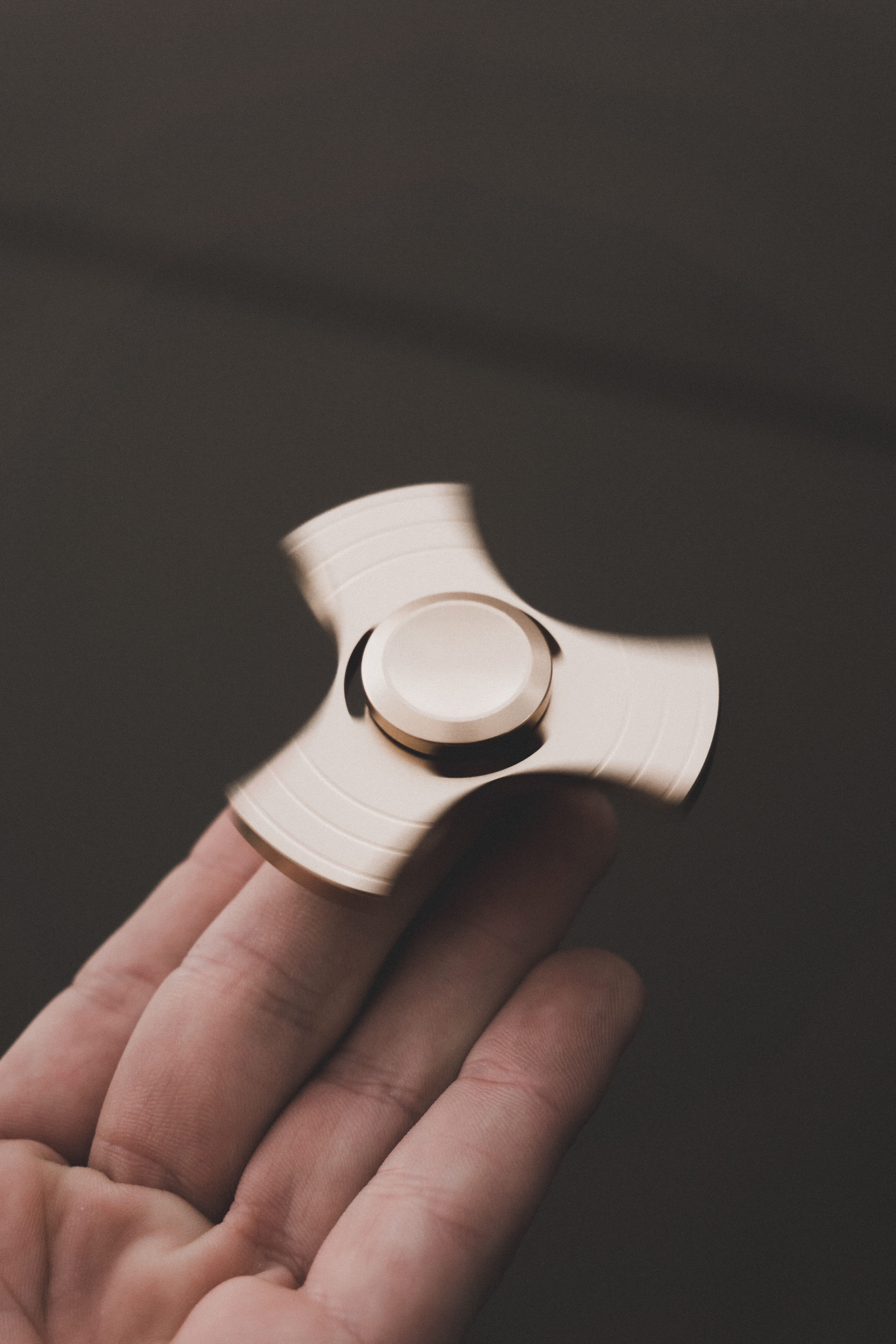 close-up, indoors, 5K, brown, holding, coffee - drink, drink, body part, gold, fingers, spinning, studio shot, toy, fidget, mug, black background, unrecognizable person, Phone HD Wallpaper