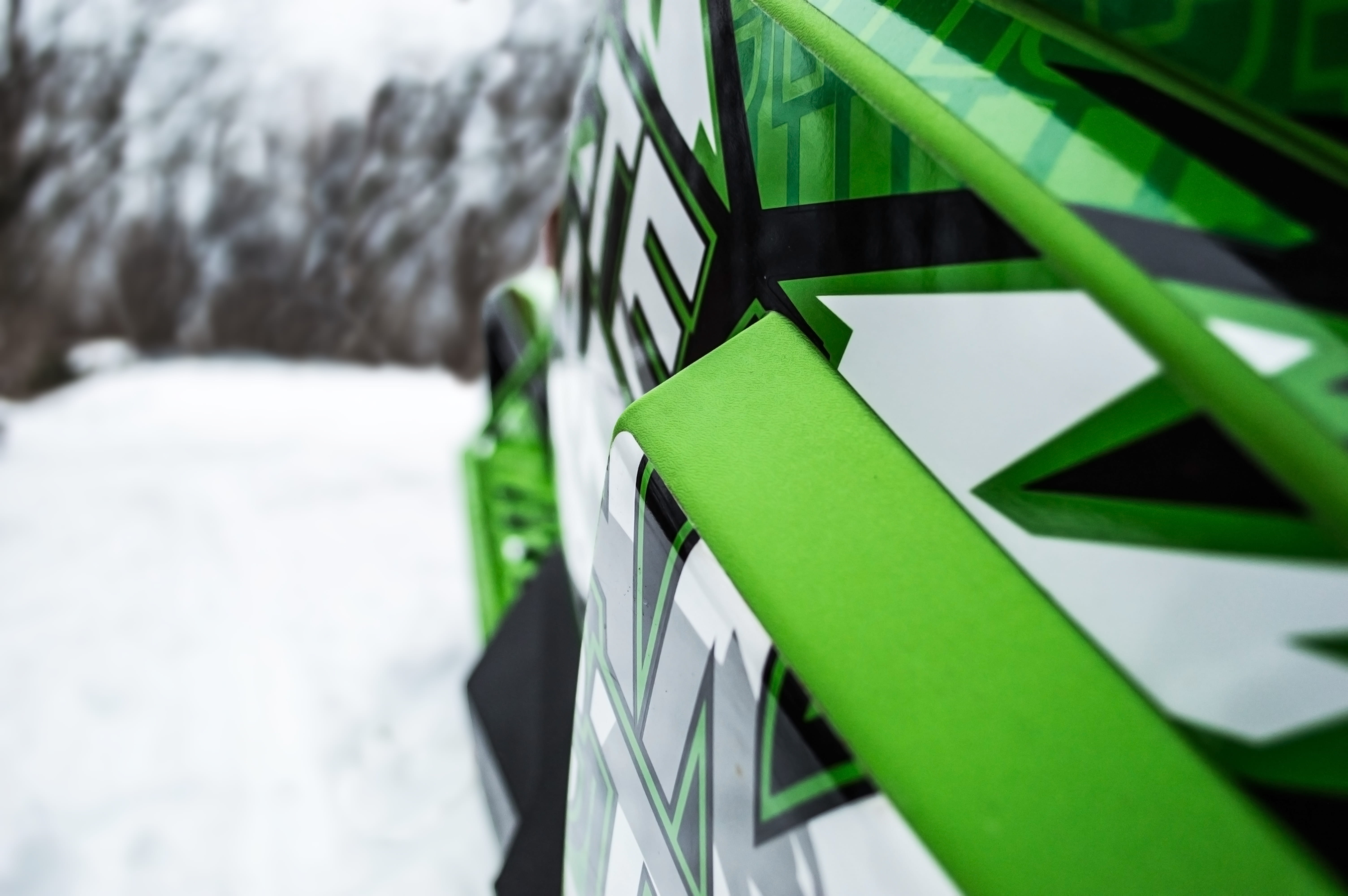 wheel, sticker, in a row, snow, outdoors, tree, winter sport, green color, barrier, no people, cold temperature, snow cross, d3200, focus, arctic cat, architecture, HD Wallpaper