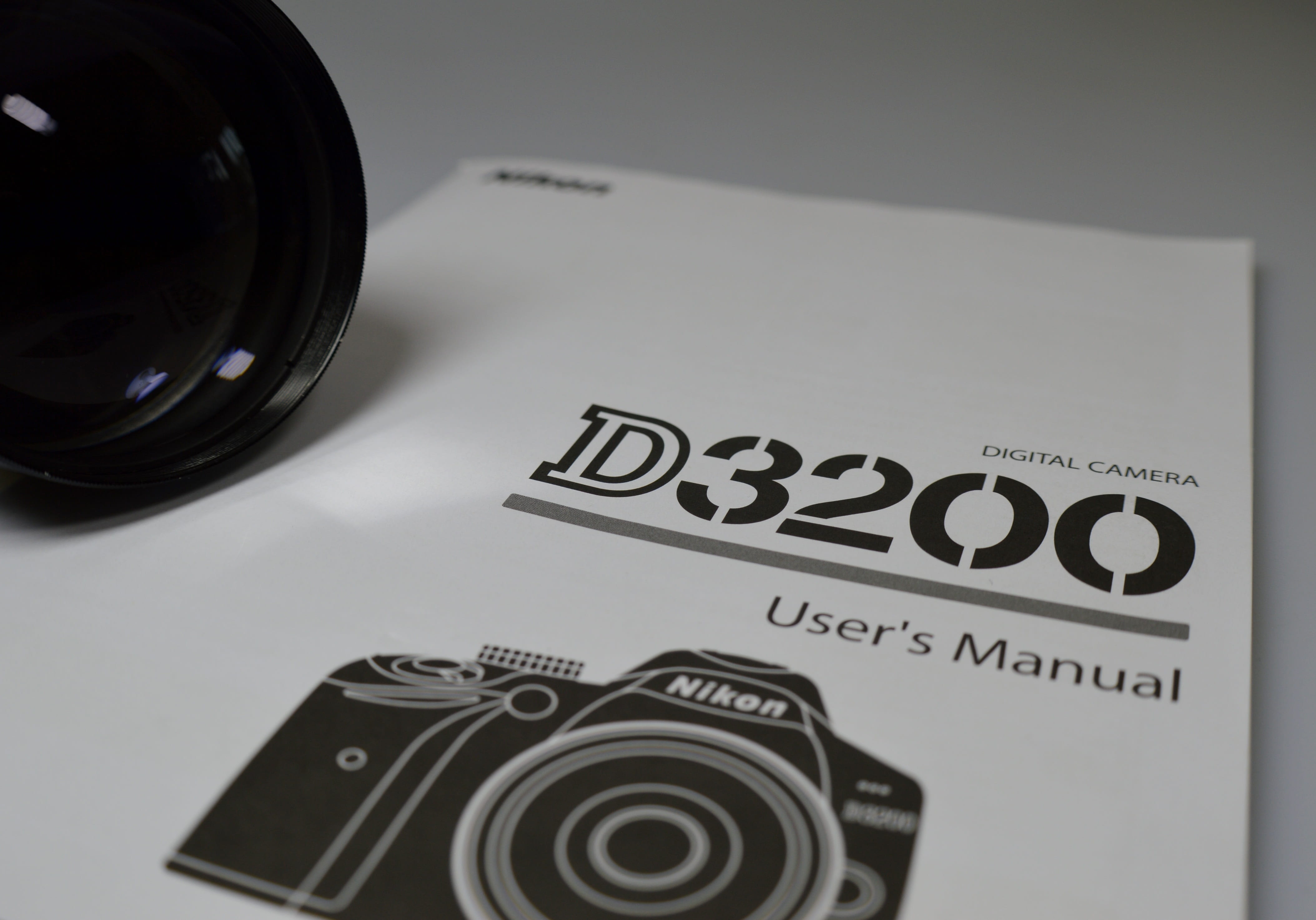manual, western script, close-up, copy space, creativity, black color, high angle view, camera, text, table, still life, d3200, arts culture and entertainment, HD Wallpaper