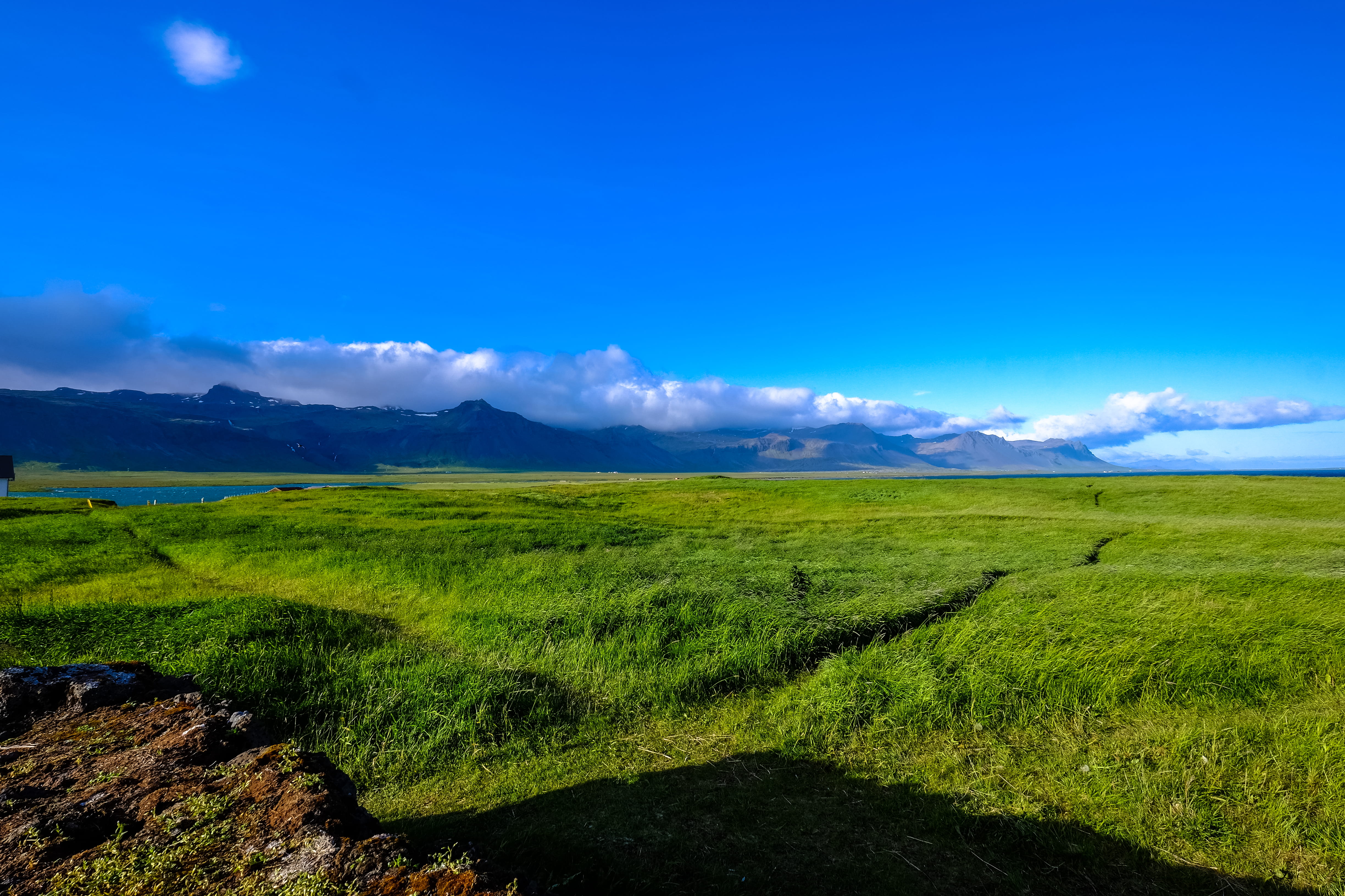 hayfield, land, day, mountain range, scenics - nature, growth, cropland, trees, countryside, blue sky, nature, farm, mountain, wheat, sky, clouds, tranquil scene, HD Wallpaper