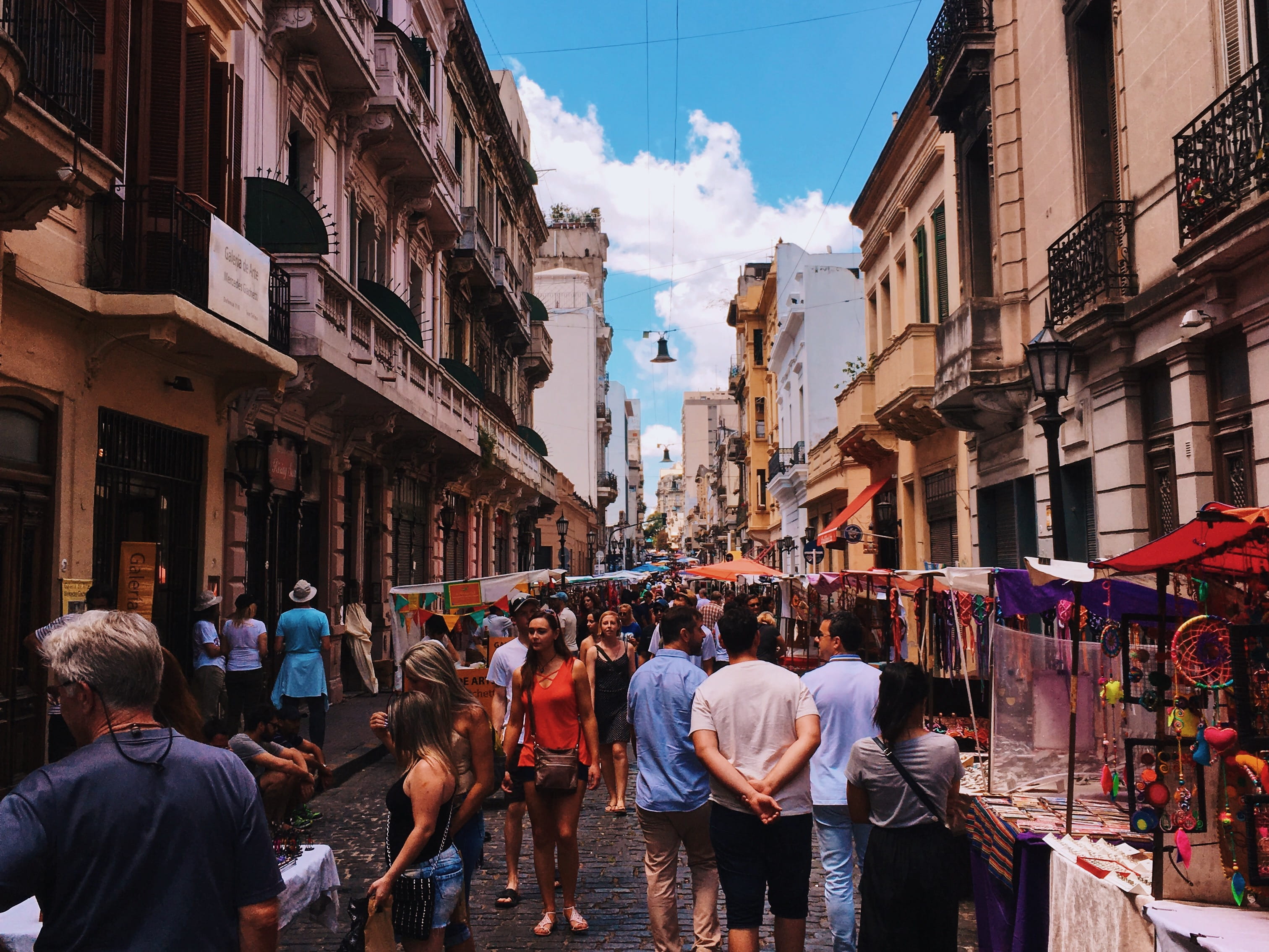 buildings, people, lifestyles, sky, built structure, street market, Buenos Aires, cloud - sky, men, high, commerce, town, architecture, rise, beside, san telmo, HD Wallpaper