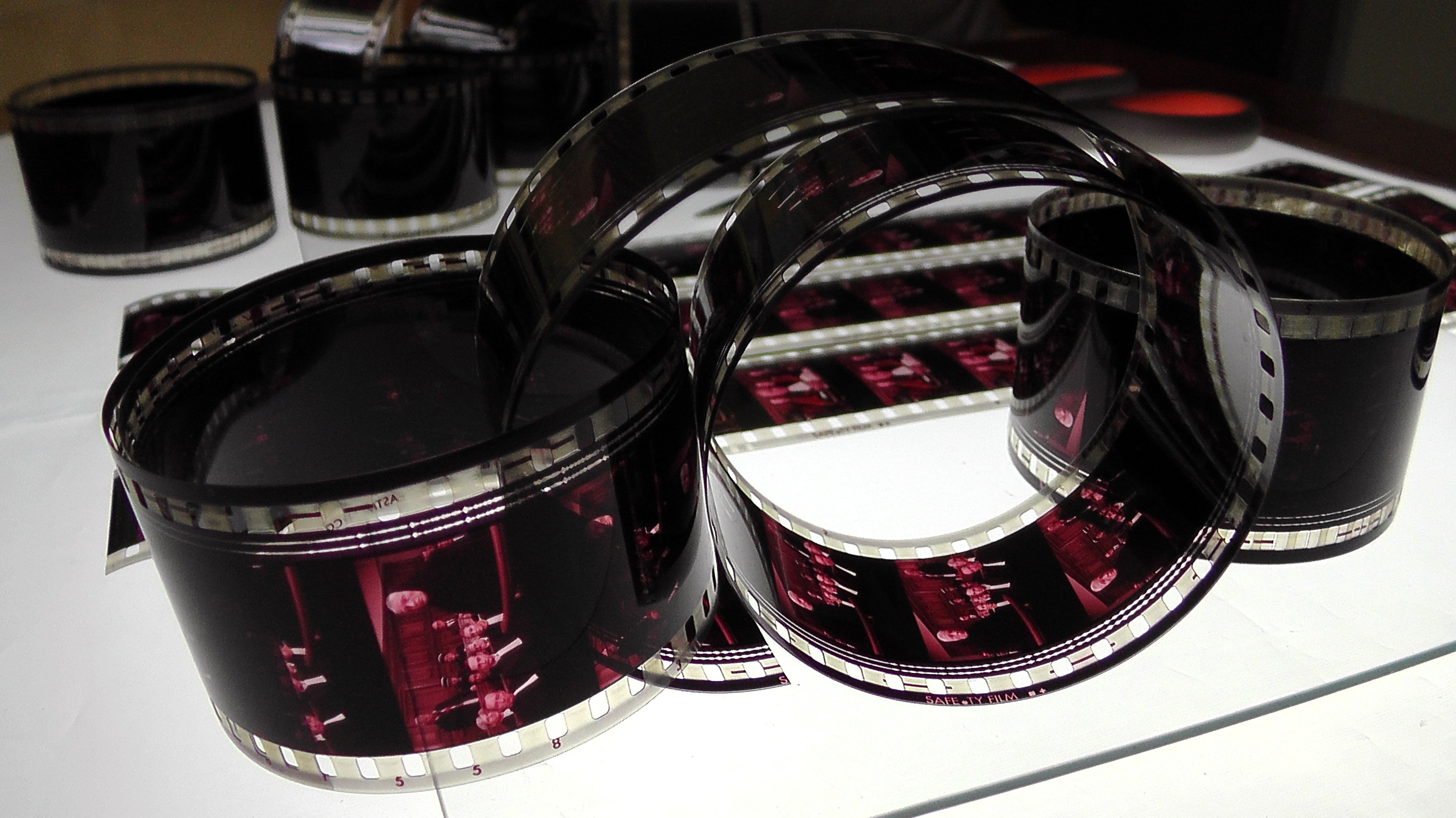 5K, 35mm film, no people, paper, soundtrack, silver colored, red, shiny, home movies, drink, glass - material, collection movies, cinema, chrome, high angle view, HD Wallpaper