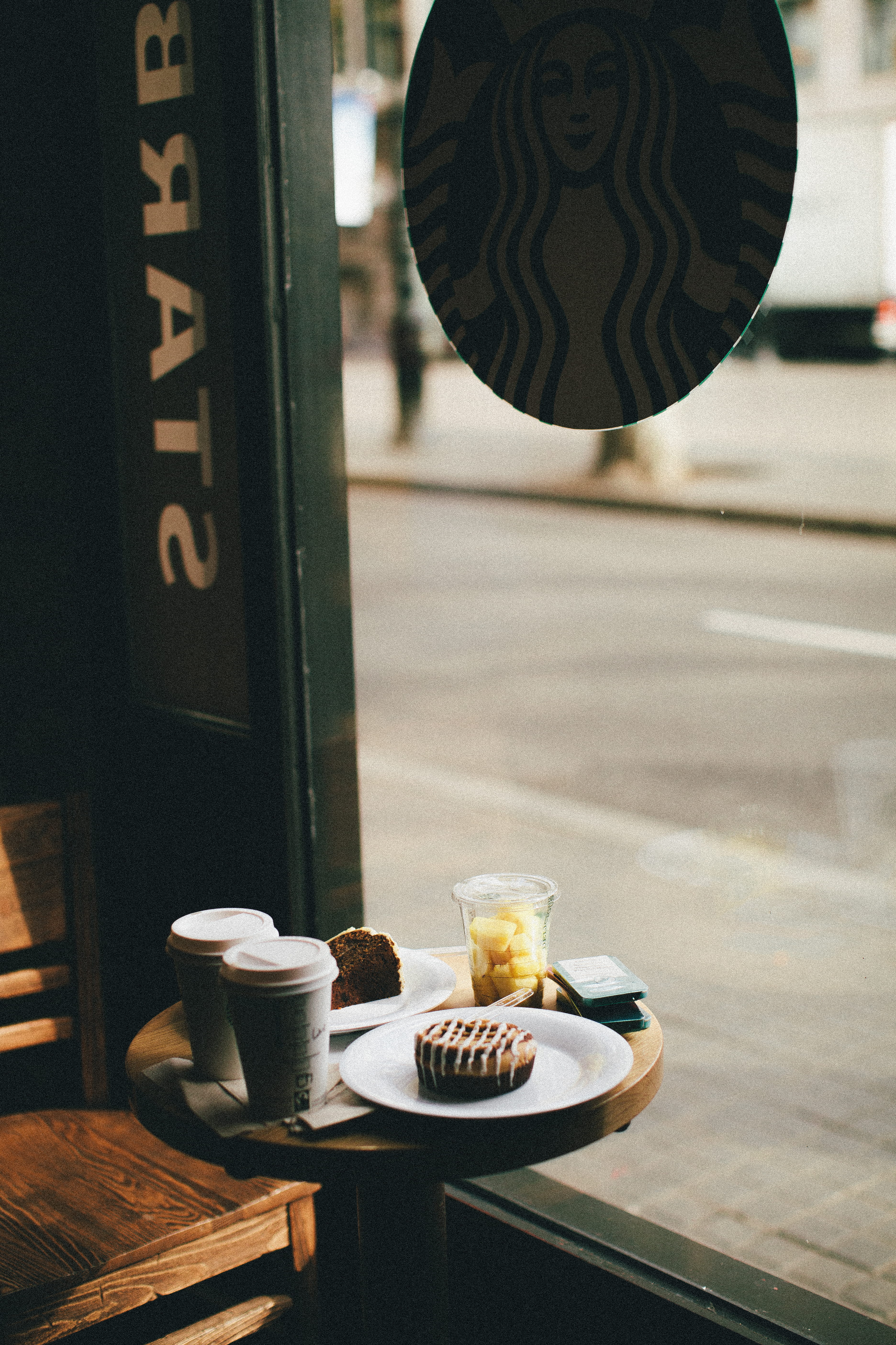 text, refreshment, freshness, blur, delicious, wood, coffee - drink, coffee shop, starbucks, drinks, city, furniture, no people, glass - material, wooden, Phone HD Wallpaper