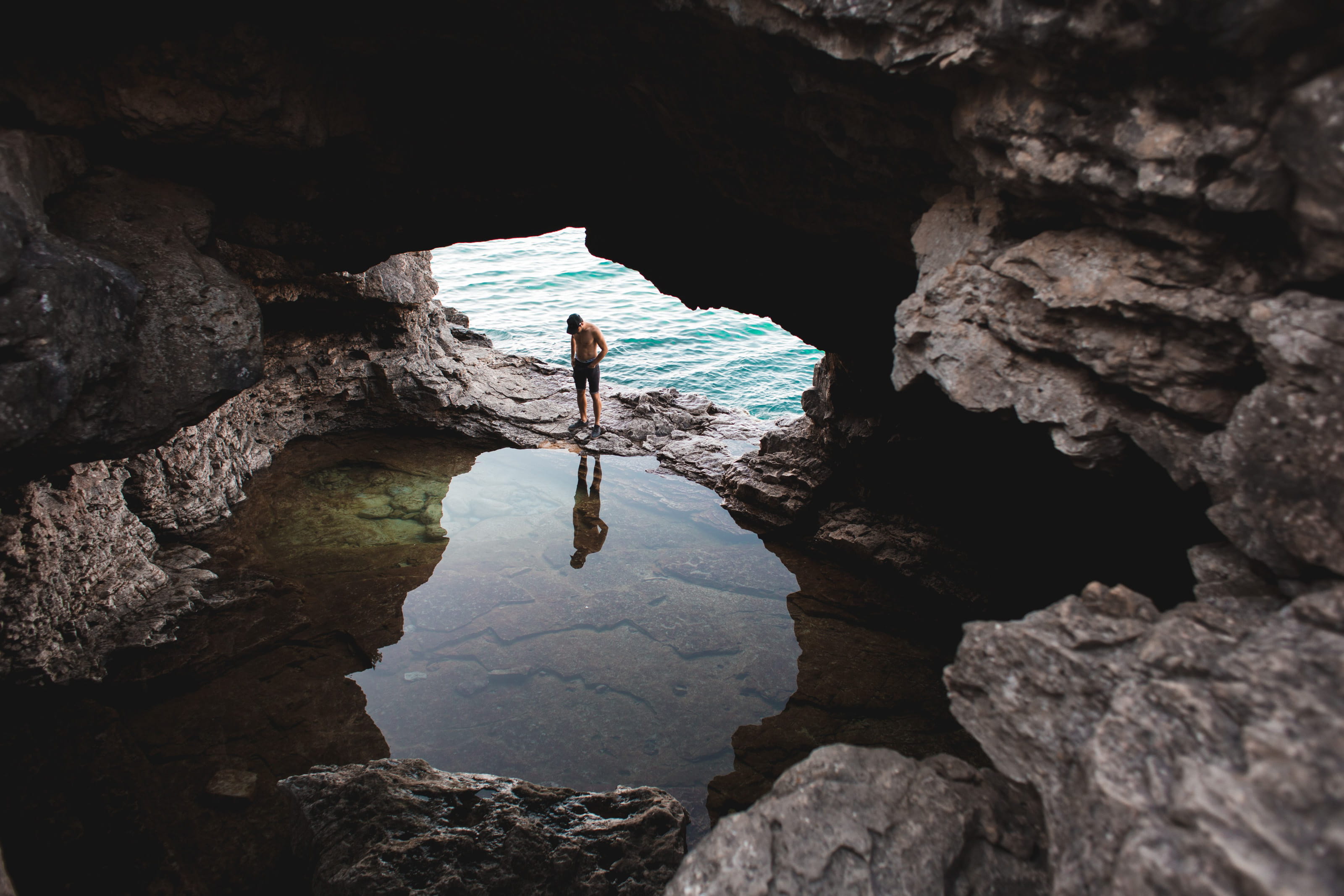 limestone, journey, entrance, open, serenity, lifestyles, near, full length, reflection, adventure, cave, man, adult, expedition, leisure activity, beauty in nature, HD Wallpaper