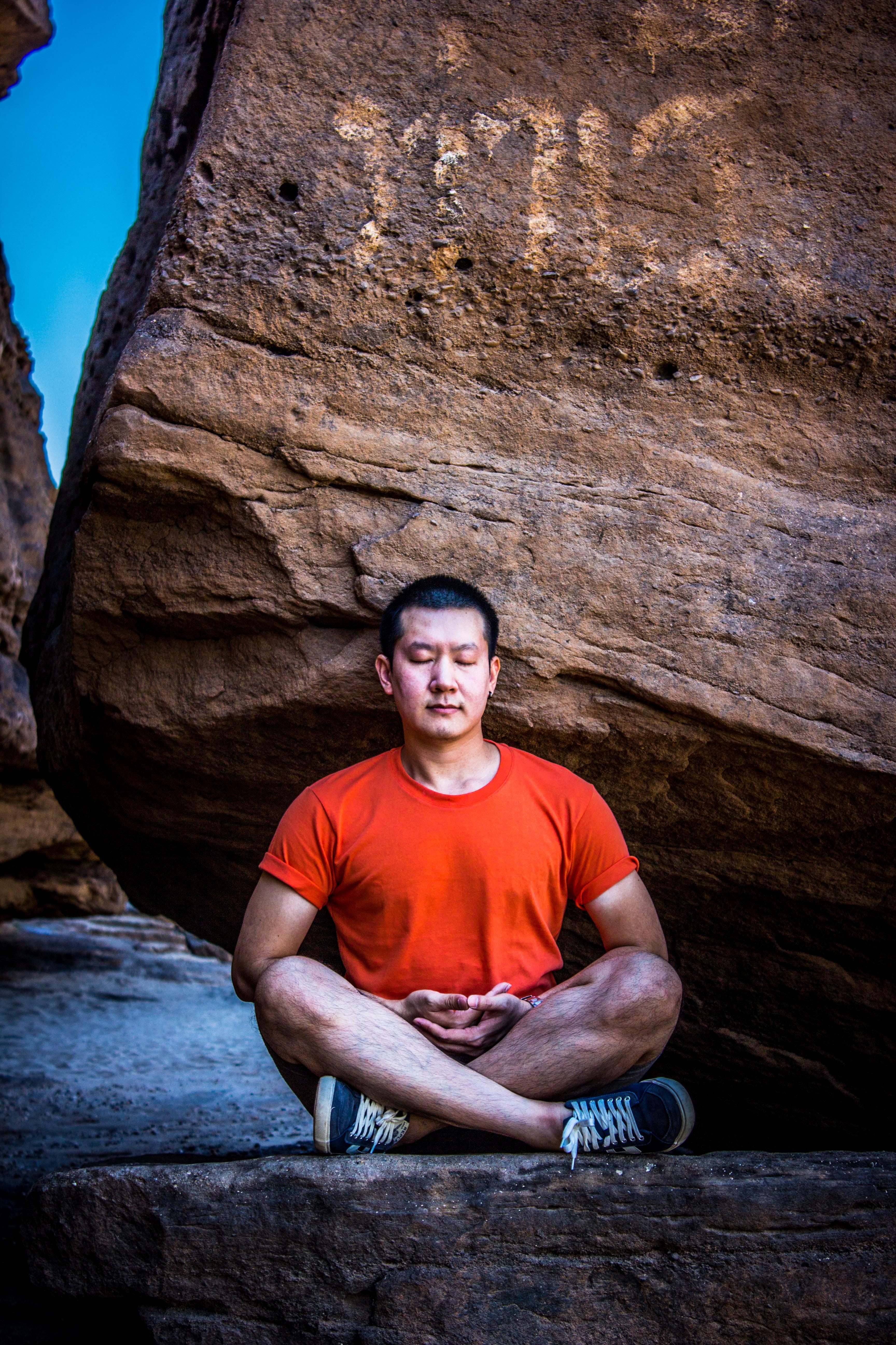 meditate, cave, legs, leisure, travel, sitting, looking at camera, rock, outdoors, outcrop, man, solid, adventure, real people, rock - object, guy, person, Phone HD Wallpaper