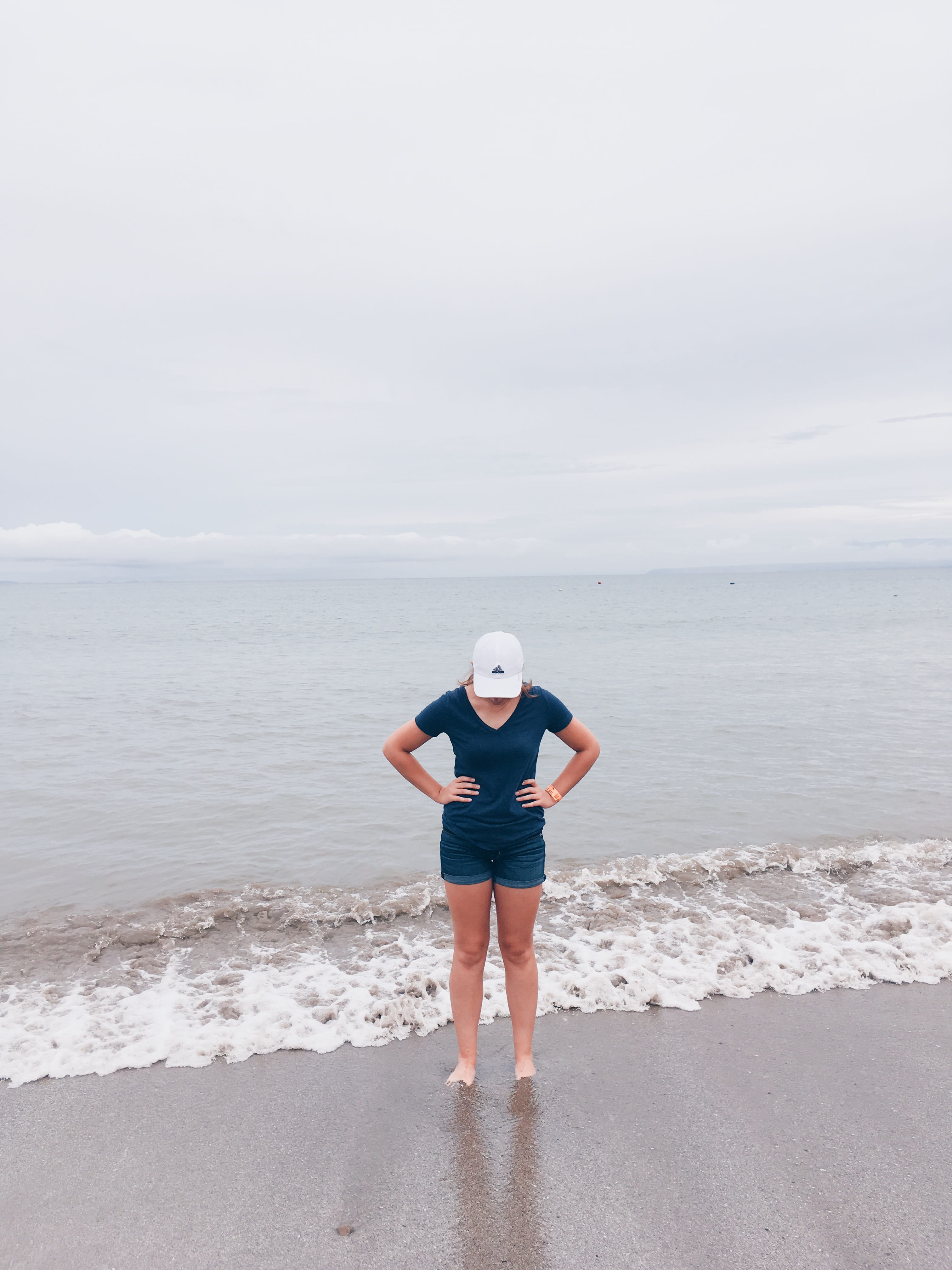 beach, casual clothing, simple, outdoors, teenager, beauty in nature, hat, shirt, clouds, nature, standing, sea shore, simplicity, leisure activity, one person, Phone HD Wallpaper